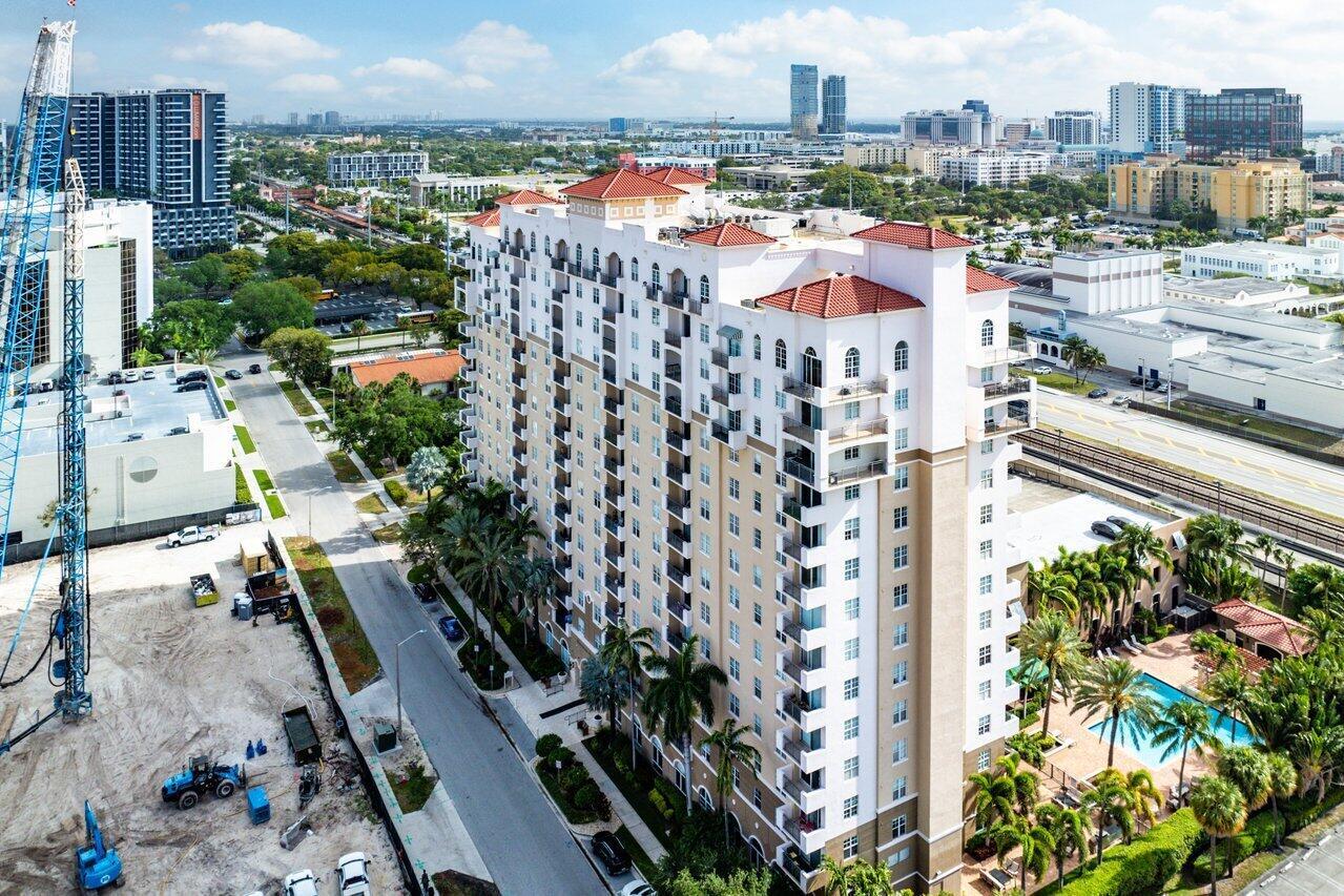 Experience upscale urban living at the highly sought-after Montecito Palm Beach. This rare 12th-floor, 1-bedroom, 1-bathroom condo offers breathtaking panoramic views of the Downtown West Palm Beach skyline. With hurricane-impact windows, an A/C (2021), and a hot water heater (2019), this move-in-ready home blends modern style with lasting peace of mind.Step inside to an open floor plan featuring 9-foot ceilings, wood-look laminate flooring, crown molding, and upgraded lighting. The stylish kitchen boasts solid wood cabinetry, upgraded hardware, sleek stainless steel Samsung appliances, an elegant light fixture, and breakfast bar seating, ideal for casual dining. The spacious living area opens to a private covered balcony with artificial turf, where you can enjoy your morning coffee while taking in stunning skyline sunrise views.

The bedroom features matching wood-look laminate flooring, an upgraded light fixture, custom baseboards, and ample closet space. Large windows with custom roll-down shades provide natural light and privacy. The 2024 remodeled bathroom showcases a solid wood vanity with quartz countertops, upgraded hardware, a modern light fixture, and a beautifully tiled walk-in shower with high-end finishes. For added convenience, an in-unit Whirlpool washer and dryer are included.

Montecito Palm Beach offers resort-style amenities, including a 24-hour front desk concierge, resort-style pool and jacuzzi, sauna, BBQ area, fitness center, social room, business center, billiards, bike storage, and a gated covered parking garage with EV charging stations. The monthly HOA covers exterior insurance, fiber-optic internet, DirectTV cable, and water.

Located in the heart of Downtown West Palm Beach, you're just steps from the NORA District, City Place, the Kravis Center, Grandview Market, and the Armory Art Center. The free Circuit Shuttle provides easy access throughout the city, and you're minutes from South Florida's finest beaches, Flagler Drive, Palm Beach International Airport, Palm Beach Outlets, Brightline, Tri-Rail, and I-95.

This exceptional condo offers the perfect mix of luxury, convenience, and vibrant city living. Don't miss out, schedule your private tour today!