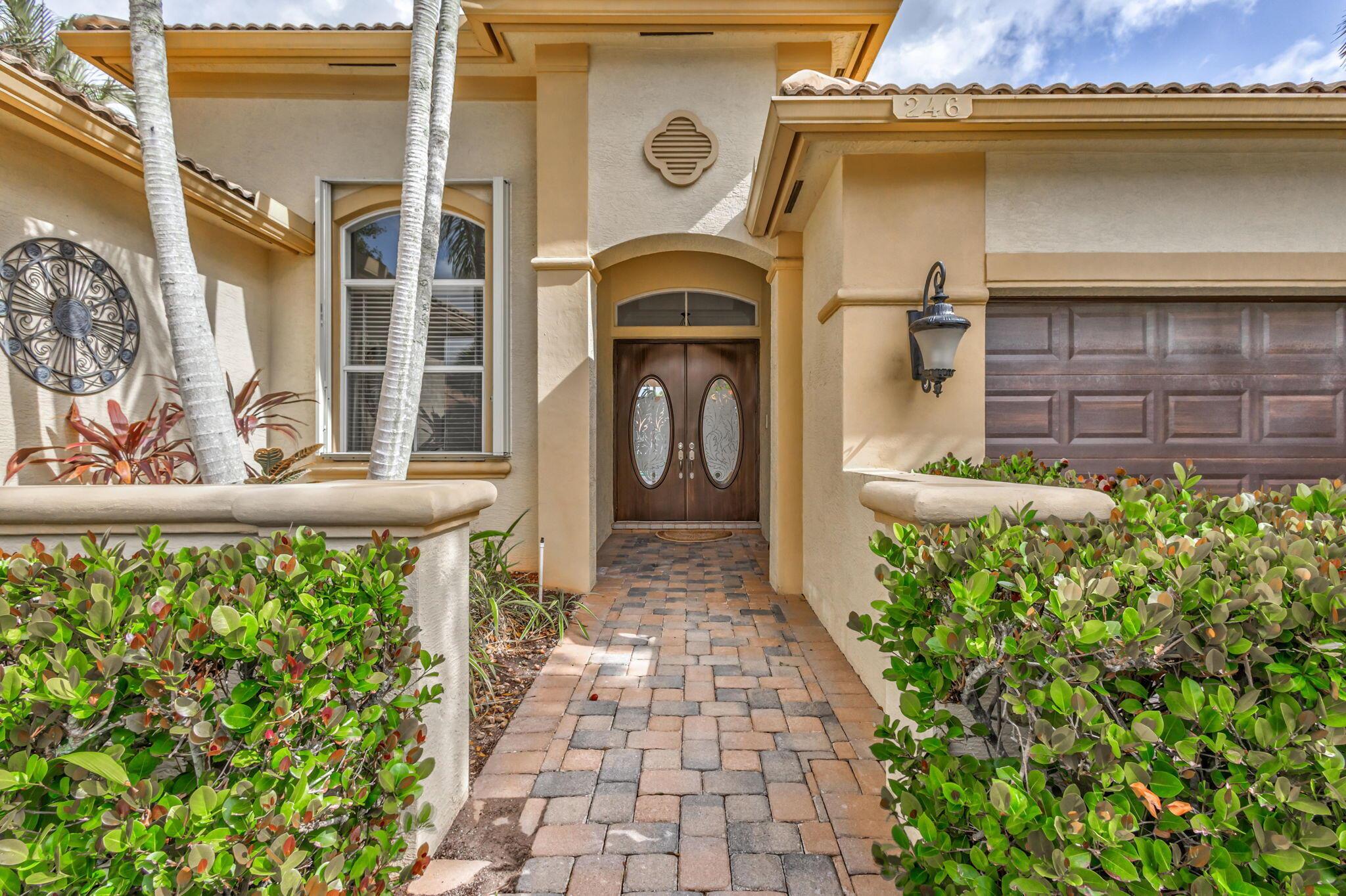 Sought after one-story model in Mirabella, in prime location. This bright, spacious home with high ceilings and serene lake views has been freshly painted. Split level: three bedrooms (optional fourth bedroom/ current den) on one side, the master overlooks pool and lake views. Open layout in the family and kitchen with access to separate dining room. The home is anchored by a great room with a wall of windows that take advantage of the outdoor views. Accordion shutters. New AC and carpet. Walk to Marsh Pointe Elementary. Clubhouse features tennis, pool, gym, community room, card room and so much more.