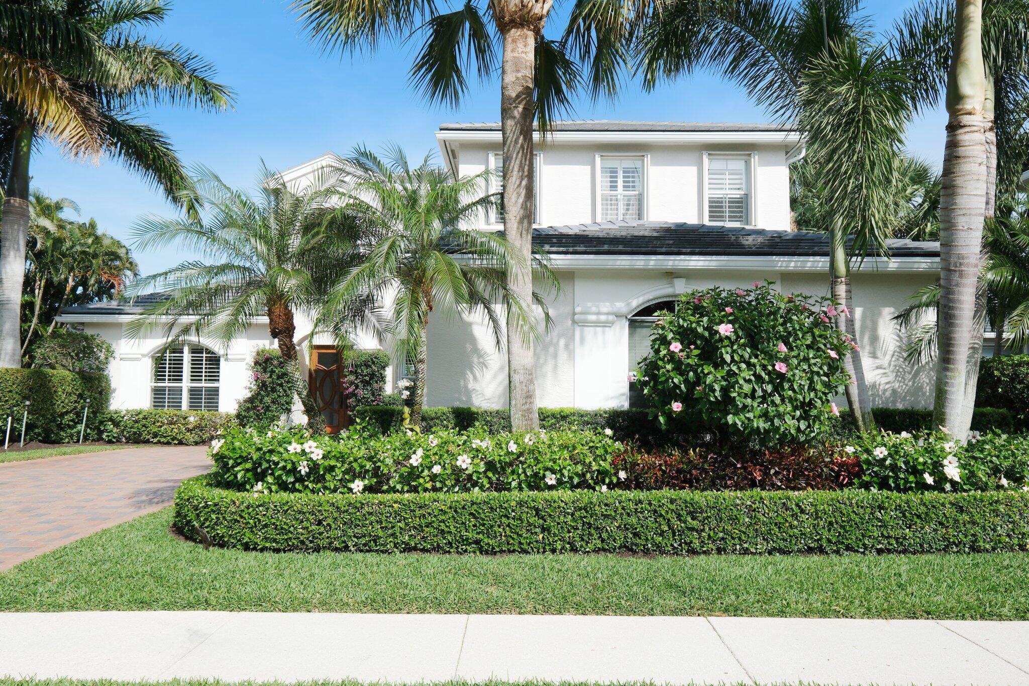 Largest lakefront pool home available in Mirabella! This 5BR, 4BA home spans 3,600+ sq ft with a first-floor primary suite featuring a spa-like bath and a flexible 2nd bedroom with full bath--perfect for guests or a home office. Upstairs offers 3 more bedrooms, 2 baths, and a loft. Private backyard with saltwater pool, built-in summer kitchen (gas grill & sink), outdoor shower, retractable awnings, and electric screens. Move-in ready with NEW ROOF, fresh exterior paint, and full hurricane protection. Additional highlights: 3-car garage with epoxy floors and separate laundry room. Mirabella offers resort-style amenities and a prime location near beaches, golf, top schools, and PBI.