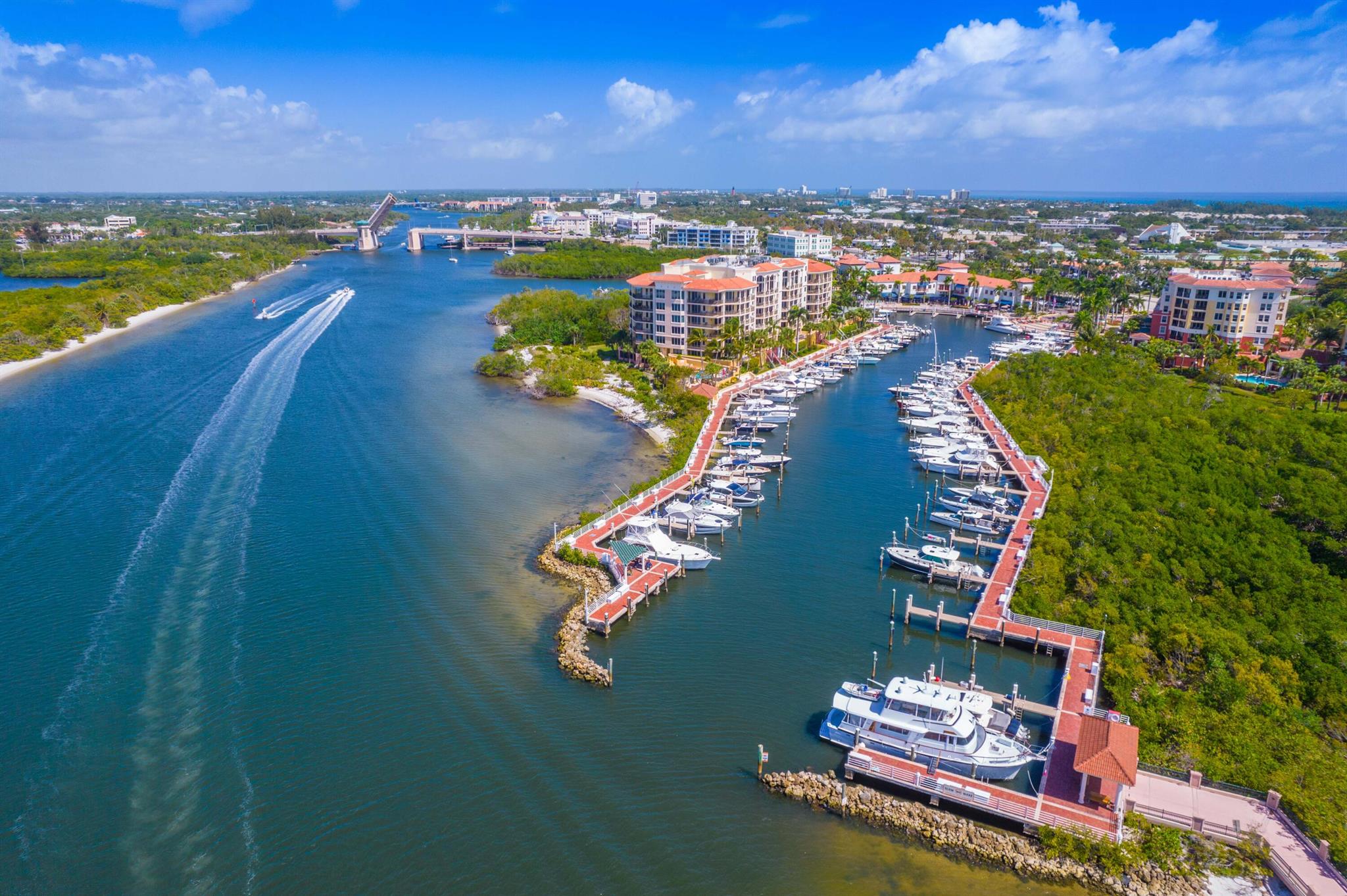 This spectacular, move-in ready two-story penthouse is one of only four in the exclusive Jupiter Yacht Club--and one of the few extensively updated units. Boasting over 3,500 sq ft, this stunning residence showcases soaring 20-foot ceilings and floor-to-ceiling windows that frame panoramic views of the Marina and Intracoastal, all while capturing the magic of Florida's west-facing sunsets.With three spacious bedrooms--all with ensuite baths--plus an office/den and a guest powder room, this home lives like a private single-family residence in the sky. Expansive sliders flood the space with natural light and lead out to a generous patio, perfect for taking in the views and coastal breeze.The Pointe at Jupiter Yacht Club offers resort-style amenities including secure under-building parking, a manned front desk, a saltwater pool and spa, a summer kitchen with BBQ area, and direct access to one of the area's most coveted marinas. Optional boat slips are available for lease or purchase.

Ideally located just steps from the Dive Bar Restaurant and adjacent to the scenic Jupiter Riverwalk, you're also moments from beautiful beaches, Harbourside Place, fine dining, shopping, golf courses, and more. Available immediately with a flexible lease term, this is a rare opportunity to enjoy luxurious waterfront living in one of Jupiter's premier communities.