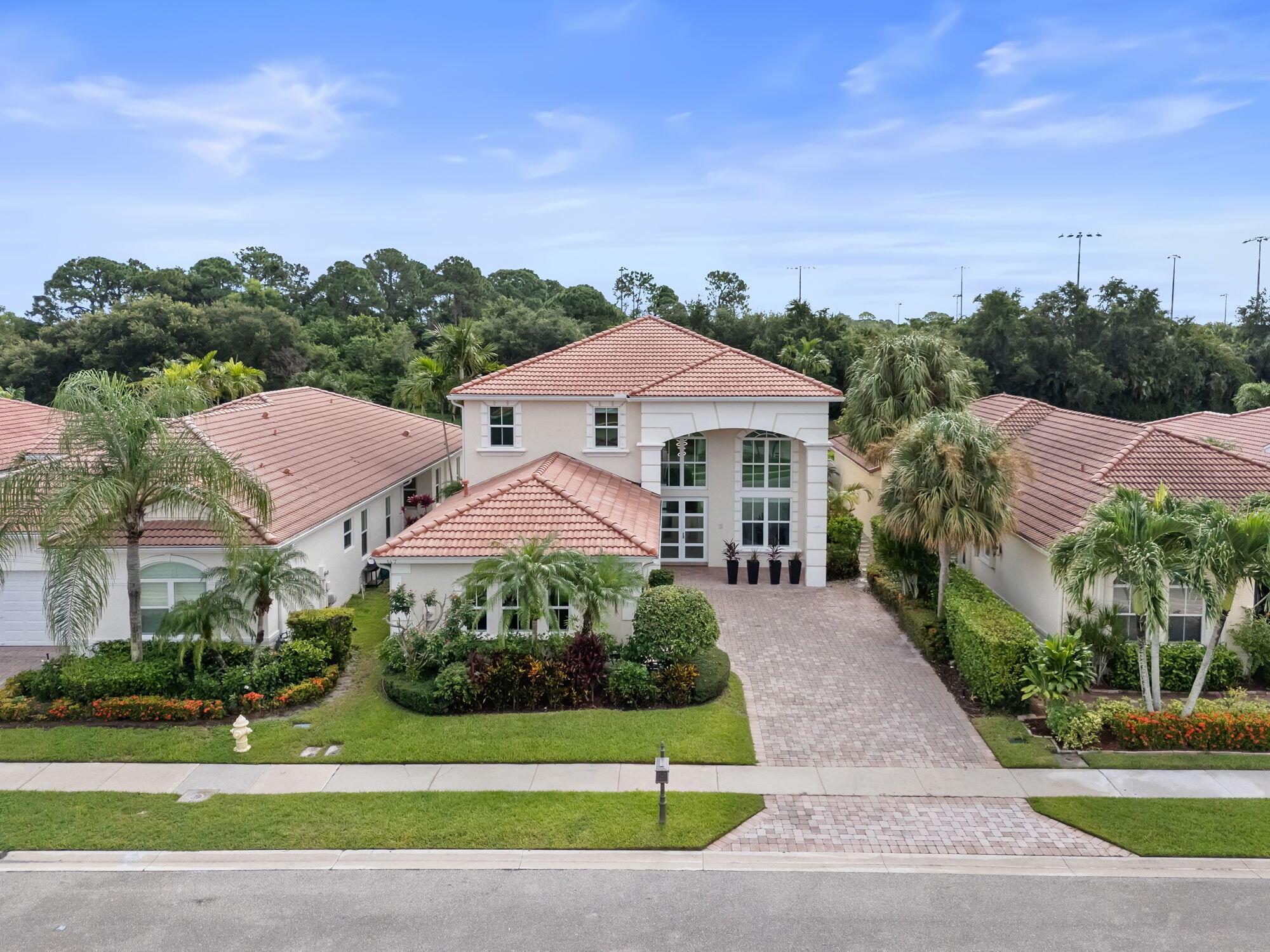 This exceptional home offers 4 bedrooms, 3.5 bathrooms, 2 lofts, a mudroom, sparkling pool, and a 3-car garage. Nestled by a serene lake, it has been fully renovated with luxury finishes. The gourmet kitchen features a large quartz waterfall island, and spa-like bathrooms with decorative tile accents. 24x48 porcelain tile floors, modern doors, chic light fixtures, and elegant plumbing fixtures enhance the space. The expansive lofts provide flexible living options. Outdoors, enjoy the revitalized pool with marble pool deck, pet-friendly turf, and stunning lake views. Impact windows and new AC units ensure comfort and security. Located in the sought-after Mirabella neighborhood, this home blends modern luxury with timeless beauty. Prepare to be captivated by this exceptional home that defines luxury and elegance. With 4 spacious bedrooms, 3.5 beautifully appointed bathrooms, 2 expansive lofts, a convenient mudroom, a sparkling pool, and a 3-car garage, this property offers unparalleled comfort and style.

Nestled in a serene lake view setting, this fully renovated masterpiece showcases a host of exquisite upgrades. The gourmet kitchen is a culinary dream, featuring a large quartz waterfall island that serves as the heart of the home. The bathrooms evoke a sense of tranquility with their spa-like design, and decorative tile accent walls add a touch of artistry throughout the space. Impressive 24x48 porcelain tile floors flow seamlessly from room to room, while modern interior doors, chic light fixtures, and elegant plumbing fixtures elevate the home's aesthetic. The staircase, adorned with sleek and sophisticated railings, is a statement of its own.

The two expansive lofts provide flexible living options, whether for a home office, playroom, or even the potential for a 5th bedroom. The large covered patio, overlooking the picturesque lake, offers the perfect setting to unwind and enjoy breathtaking sunsets or host intimate gatherings.

Outdoors, the newly installed marble pool deck sets the stage for relaxation, complemented by pet-friendly turf for added convenience. Impact windows throughout ensure safety and security, while two brand-new AC units promise year-round comfort. This home is truly an oasis, blending modern luxury with timeless beauty.

Located in the highly sought-after Mirabella neighborhood, you're just moments away from top-rated schools, lush parks, and a variety of restaurants. This is more than a home; it's a lifestyle waiting to be embraced.