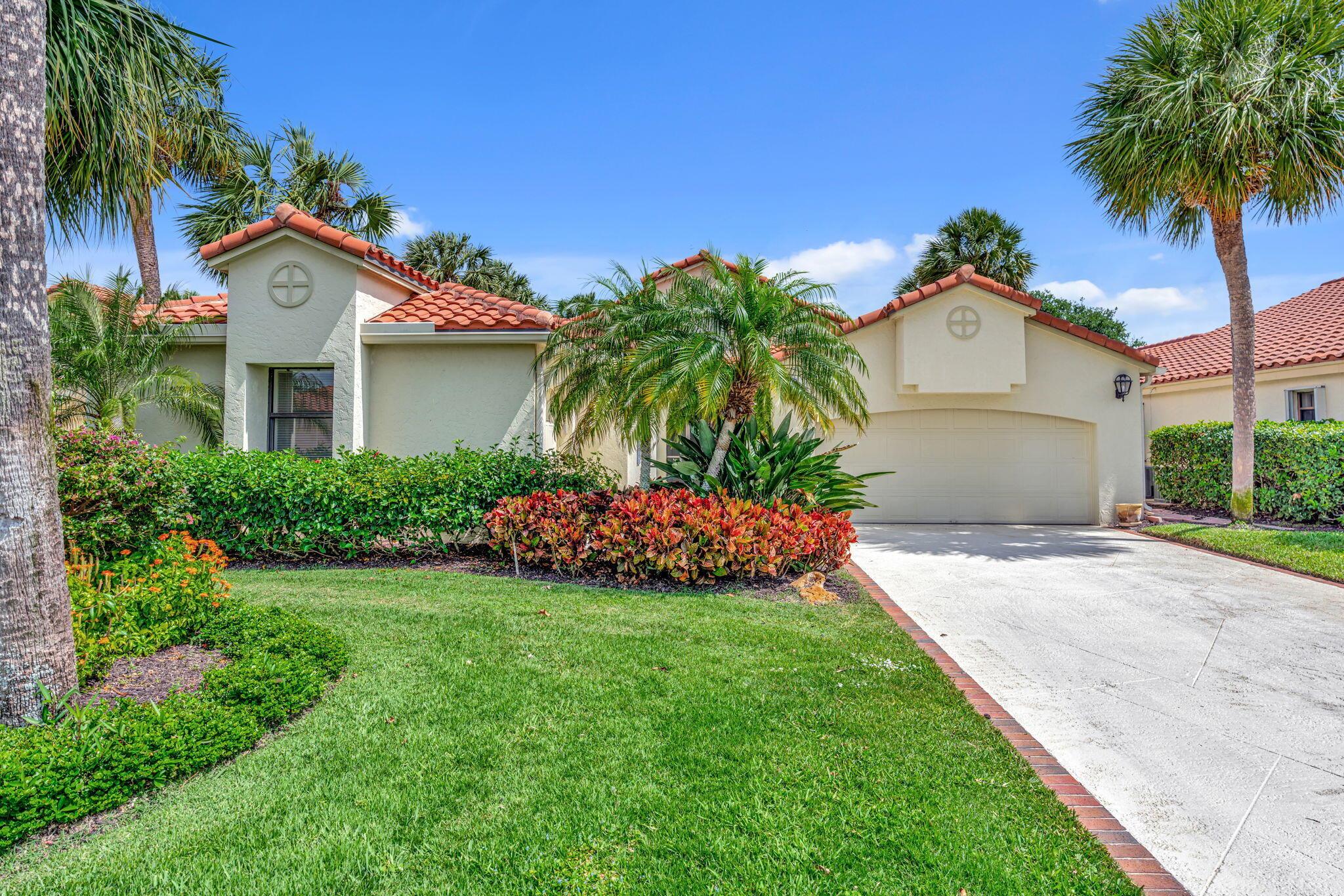 Situated in highly desirable Hidden Cove community of Jonathans Landing.  This lovely home enjoys exceptional view East over the 18th Hole Village Course, the marina & yacht basin.This 3 BR, 3.5 bath plus office has a screened in patio with expansive views and is in very good condition. 24'' diagonal Italian porcelain floors thoughout.  Being sold furnished. Roof is 2016, water heaters 2017 & 2025, AC 2022.