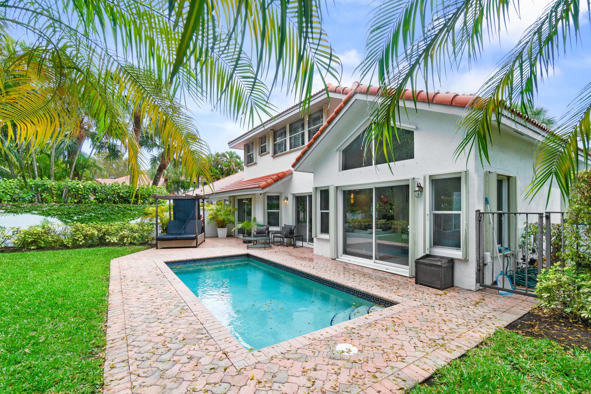 Bright and airy 3 bedroom / 2.5 bathroom home located in the prestigious Broken Sound Country Club.  This house sits on an oversized private lot offering its new owner a large yard and beautiful salt water pool.  The interior features a spacious lower level with an open floor plan between living and dining areas.  All bedrooms are located on the second floor, power room is located on the main floor, roof 2014. Broken Sound Country Club offers a newly renovated Clubhouse with endless activities: two 18 hole golf courses, 22 tennis courts, 8 pickle ball courts, 4 restaurants, gym, basketball, salon, sauna, steam room, three pools, game room, billiard room, card rooms. Conveniently located near shopping, dining, beaches, close to I-95 turnpike, Palm Beach and Ft. Lauderdale Airports.