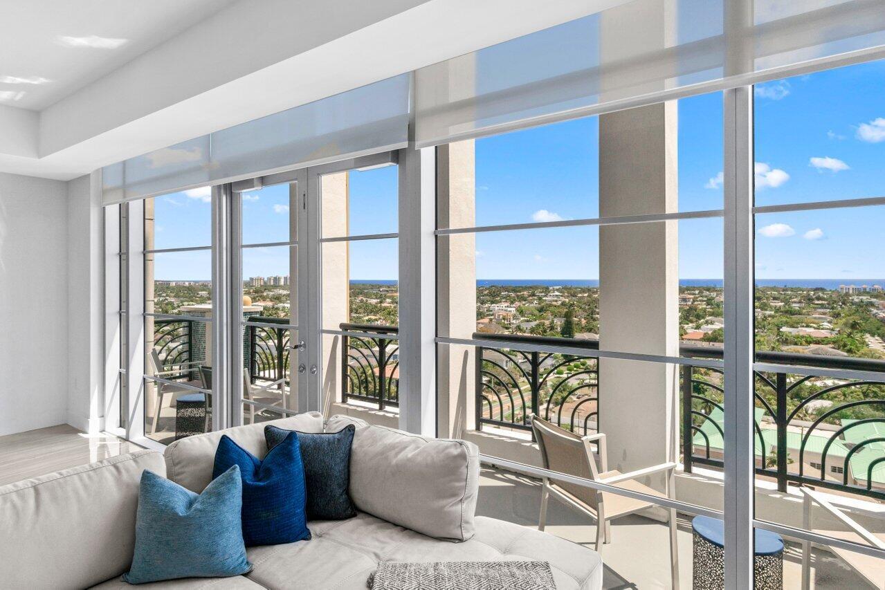 Experience luxury living at its finest in this breathtaking 12th-floor penthouse located in the heart of East Boca. Boasting panoramic ocean and city views, this contemporary furnished 3 bedroom, 3.5-bath residence offers unmatched elegance and style. The master suite is conveniently located on the main floor, providing ultimate privacy & comfort. Floor-to-ceiling windows flood the space with natural light. The chef's kitchen features quartz countertops, Italian cabinetry, Subzero refrigerator, & a spacious center island perfect for entertaining. Steps away from downtown Boca & Mizner Park, this penthouse combines upscale living with unparalleled convenience. Don't miss the opportunity to make this extraordinary residence your own!