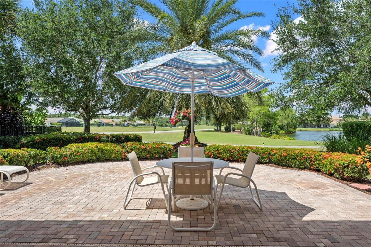 Views, Views Views, Fabulous Single Level 3 Bed/2.5 Bath + Den Home with Fantastic Double Lake & Golf Course Views. Open Kitchen has Top Notch Appliances, Distinct Granite Counters & Backsplash, Tons of Cabinet Space + Breakfast Area. Open Floor Plan has a Separate Den/Office, Living & Dining Rooms. Panoramic Windows & Doors Provide Extended Patio, Lake & Golf Course Views. Outstanding Interior & Exterior Features Include; Classic Diagonal Marble Tile & Plank Wood Floors, Tray Ceilings, Designer Window Treatments + Impact Glass. Extended Tree Shaded Patio Has a Covered Patio/Lanai with a Built-In Gas Grill. 2 Car Garage has Easy Care Epoxy Floors. Enjoy all the Resort Country Club Amenities of Jupiter Country Club, Minutes from the Airport, Beach, Shops & Restaurants.