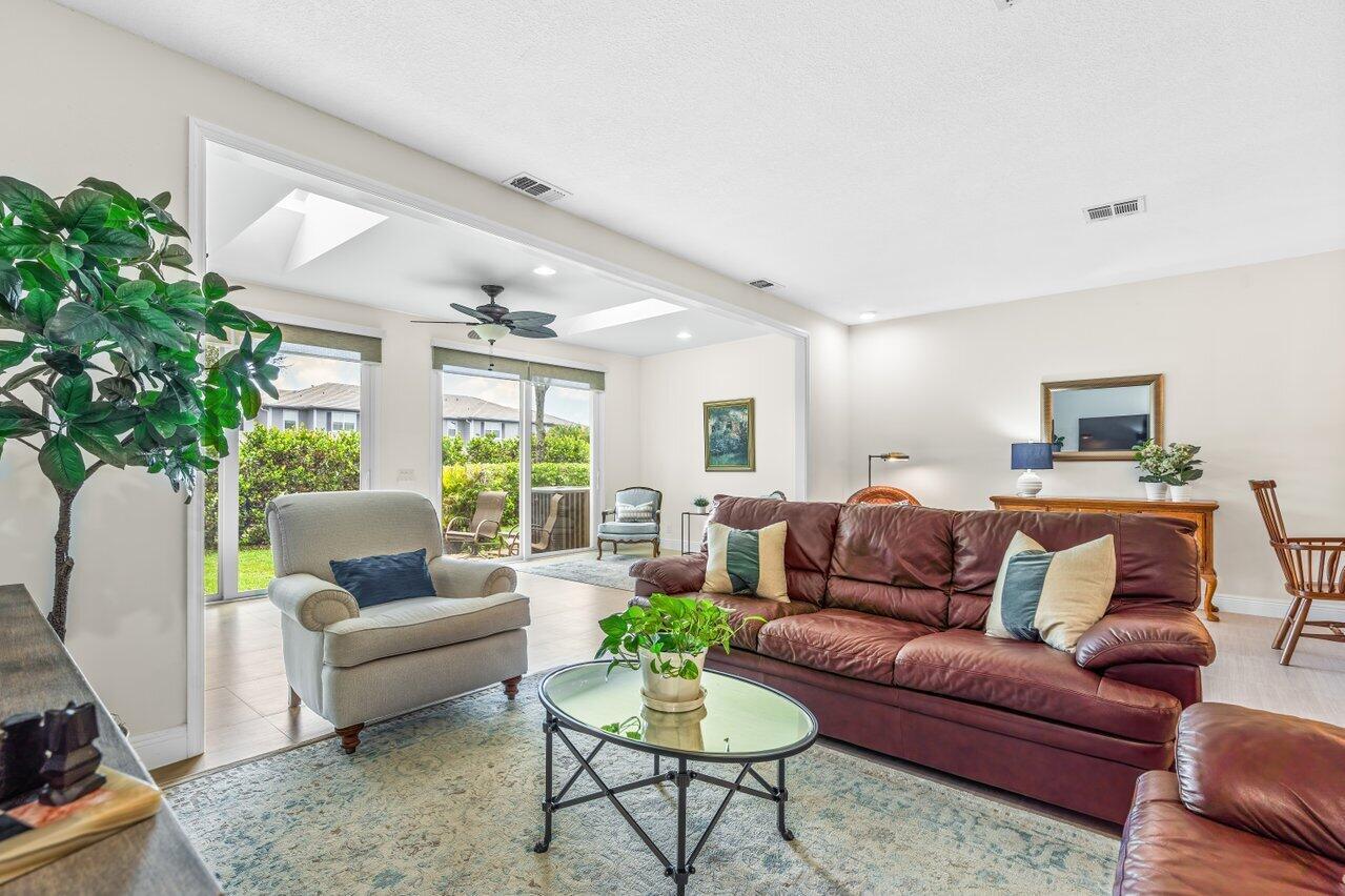 Light, bright, & spacious 3 bedroom, 2.5 bath townhome w/ 2000 living sq ft. in highly sought after Plum/Cortina at Boca Pointe. This beautifully remodeled townhome w/ an open floorplan & fully enclosed patio which smoothly flows from the living area features ALL NEW impact windows & sliders, luxury flooring, an updated kitchen w/ modern cabinetry, granite countertops & ss appliances, updated guest bath & powder room, no popcorn ceilings, custom closets, 2020 a/c, 2023 hot water heater, & the list goes on. Walking distance to community pool. Membership to The Boca Pointe Club is available, but OPTIONAL. Condo dues include master insurance, roof maintenance, landscaping, water, alarm, & cable. Investor friendly (can rent up to 4x a year with no waiting period). Schedule a private showing.