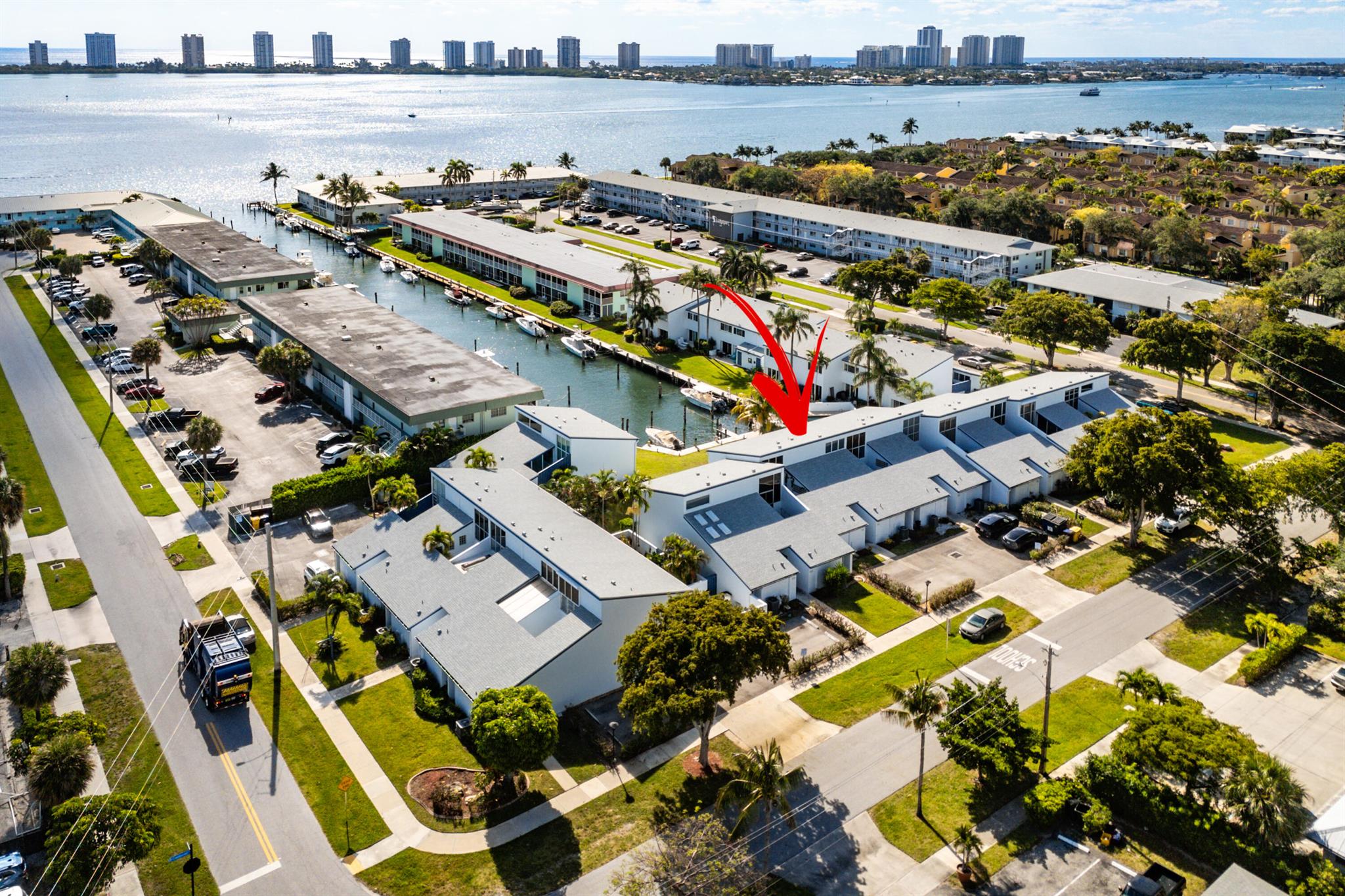 On the intercoastal waterway with access to boat dockage and the Palm Beach inlet- this is a chance to make this town home your very own with your totally new renovation!