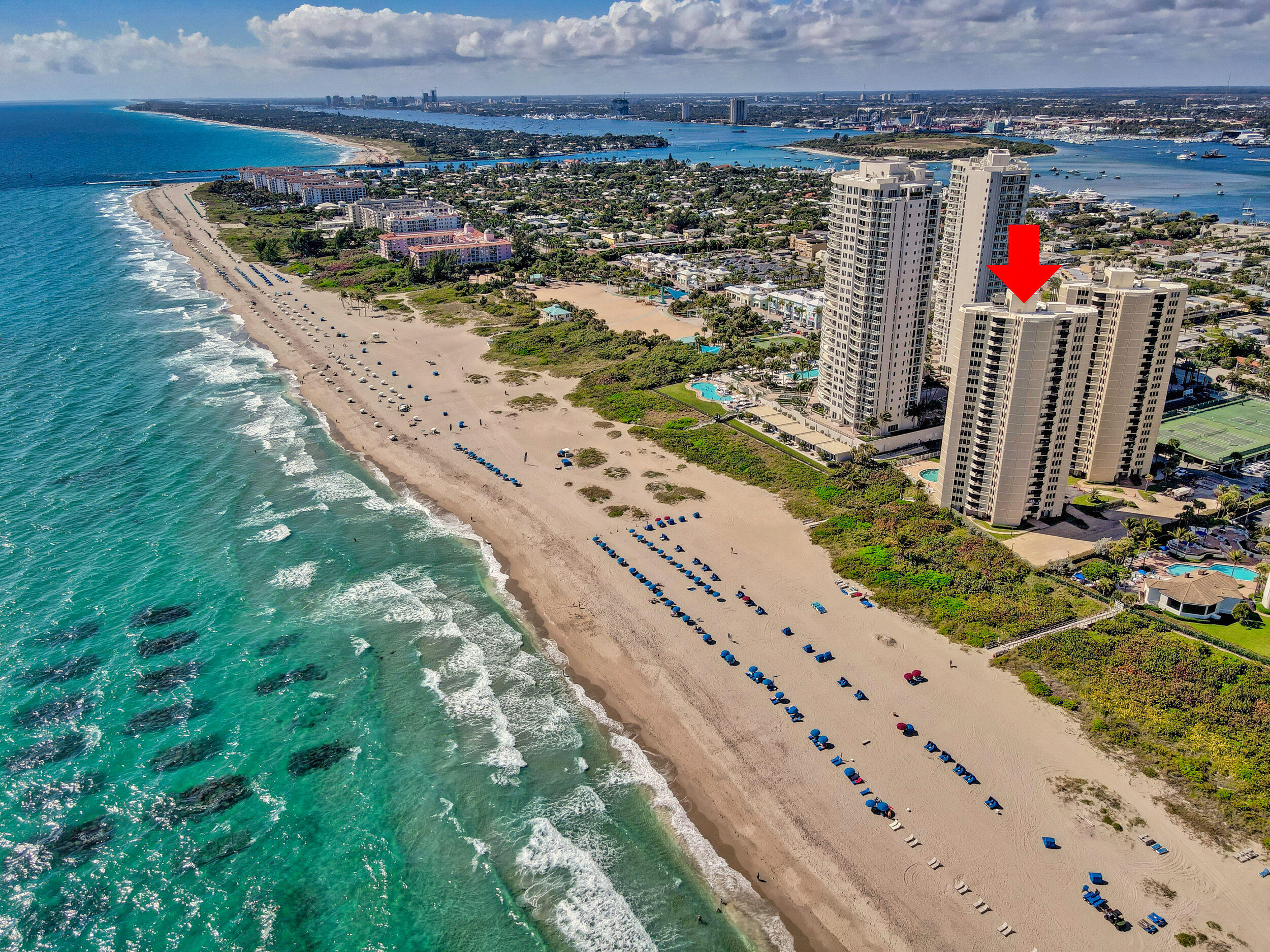 Enjoy breathtaking ocean views from every room in this fully furnished 2-bedroom, 2-bath condo at Phoenix Towers on Singer Island. This turnkey beachfront residence offers panoramic views of the Atlantic from the living room, main bedroom, and guest bedroom. Whether you're searching for a second home, seasonal retreat, or full-time residence, this condo is move-in ready and comes with two covered parking spaces.Step outside and spend your days on the beach or take advantage of the building's resort-style amenities including a fitness center, shuffleboard, BBQ grilling area, and private beach access.Phoenix Towers is ideally located just minutes from Palm Beach Gardens, known for its upscale dining, world-class golf courses, high-end shopping at The Gardens Mall, Downtown at the Gardens, and Legacy Place. Convenient access to I-95, PGA Boulevard, and just a short drive to Palm Beach International Airport (PBI) makes this a perfect coastal getaway or investment property.

Live the Singer Island lifestyle&#x14;relax on the sand, explore nearby parks and marinas, or enjoy fine dining and entertainment. Own a slice of paradise on Florida's beautiful east coast.