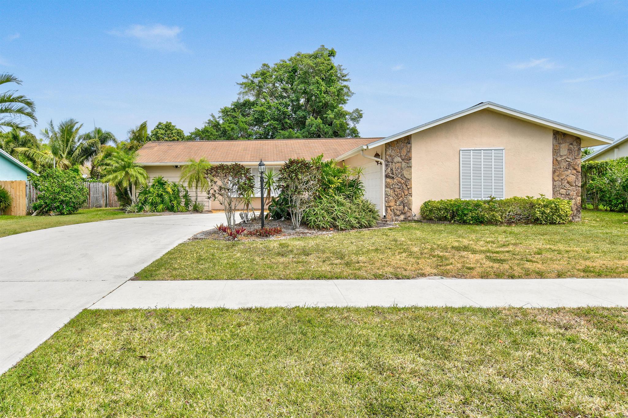 This exceptional residence is located in the center of Tequesta! Close to all the hotspots of Jupiter! The master suite, along with its bathroom, is situated on the northern side of the property, while the two additional bedrooms are located on the southern side, sharing a bathroom equipped with a tub and shower combination. The kitchen offers a view of the pool, enhancing the home's appeal. The backyard features an in ground pool and a screened patio, providing a perfect space for relaxation. Additionally, a fire pit has been thoughtfully constructed in the northeast corner of the yard. The home is close to the beaches and boat ramps! No HOA or restrictions! Brand new AC unit! Schedule a showing today! NEW ROOF JUST FINISHED!!