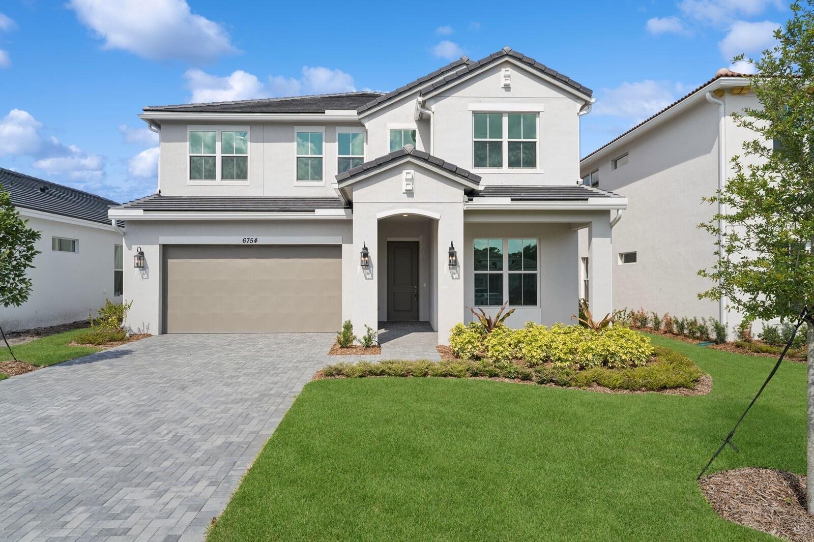 Welcome to the Vallejo - A Stunning 5-Bedroom, 4.5-Bath Home with 3-Car Garage | 3,562 Sq FtMove into luxury living in the Vallejo, a thoughtfully designed 5-bedroom, 4.5-bathroom residence offering 3,562 square feet of refined elegance. Perfectly blending comfort and sophistication, this home features a grand open-concept layout ideal for entertaining and everyday living.The chef's kitchen is the heart of the home, boasting sleek quartz countertops, high-end stainless steel appliances, custom cabinetry with elegant glass fronts, and a large center island with ample seating. The space flows seamlessly into the expansive living and dining areas, framed by stylish pendant lighting and designer finishes.Retreat to the spacious primary suite, complete with a spa-inspired ensuite bath