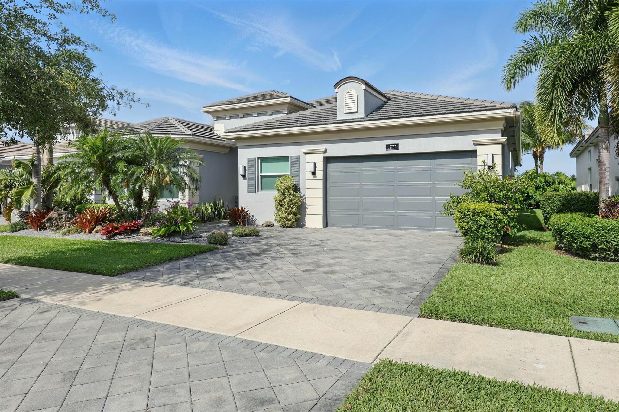 One-of-a-kind Julia model in Valencia Bay with breathtaking lake views from the main living area, kitchen, and primary bath. This 3BR, 3.5BA + den residence blends contemporary style with thoughtful functionality and is loaded with upscale upgrades, including impact glass, 8' solid-core doors, elegant tile flooring, smart home technology, a whole house generator, and a private pool set against a serene lakefront backdrop. All bathrooms have been exquisitely renovated with luxurious, high-end designer finishes. The open-concept layout showcases a chef's kitchen with premium appliances and a large island--perfect for entertaining or everyday living. The expansive primary suite offers spa-like comfort, custom touches, and tranquil water views. Modern, refined, and truly unmatched.