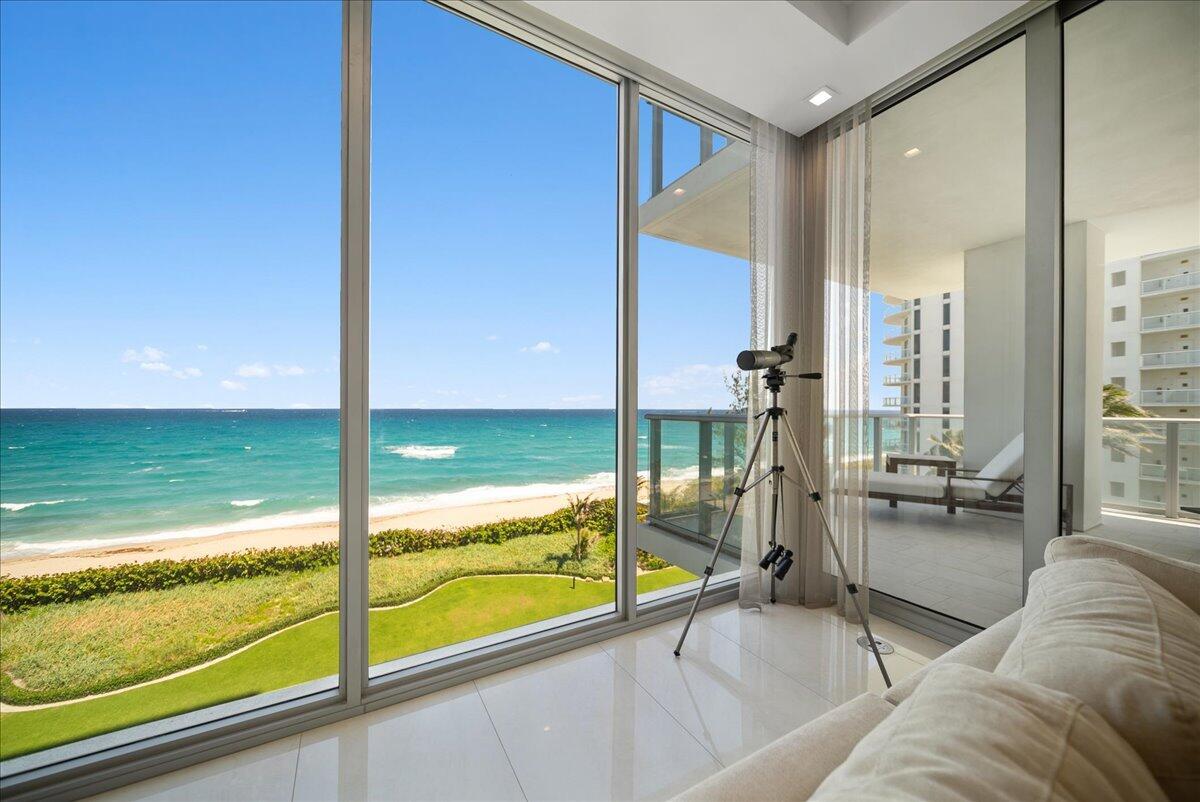 Experience oceanfront living at its finest in one of the Palm Beaches most exclusive boutique buildings- 5000 North Ocean. Built in 2020, 5000 consists of just 48 residences located directly on the sand awarding its residents with 340' of pristine private beachfront. Upon entering this Steven G. designed residence via an access controlled elevator, you are greeted with the hues of blue Singer Island is renowned for. Located on the 6th floor, 603 offers a degree of connectivity to the beach that is unparalleled through floor-to-ceiling windows overlooking the Atlantic. Graciously appointed at 3,753 interior SF with 765 SF of terrace space, this 3 bedroom 4.5 bathroom corner home awards both oceanfront sunrises and sunset vistas over the intracoastal. The European kitchen features Thermador appliances (a 5-burner gas cooktop for the cooks!), a walk-in pantry and an oversized quartz island. The dining and formal living room both enjoy eastern exposures with sweeping ocean views. Wake up in the primary suite to the ocean and step out to your oversized terrace to enjoy salty morning breezes. The second and third bedrooms are located on the west side of the residence and both feature en-suite bathrooms allowing privacy for guests. There is a family room on the southwest corner, which can be converted into a 4th bedroom. The home also has a proper laundry room with full-sized Electrolux machines. 

The building offers its residents resort-style amenities including 24/7 concierge, a 24/7 manned security gate, state-of-the-art fitness center, cabanas, a club room and south-facing pool. Come see why Singer Island has been a growing destination for those seeking luxury living on the sand 15 min to Palm Beach, Jupiter and PBI!