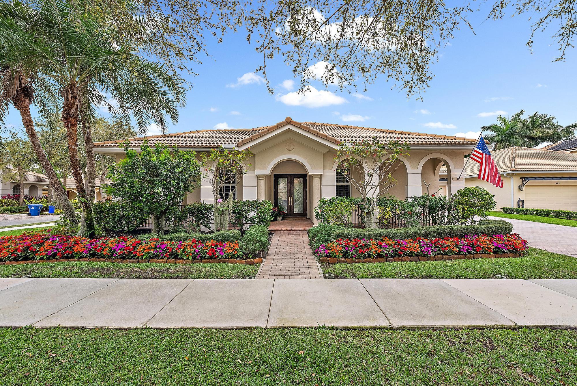 The best layout in Paseos, this meticulously maintained, 4-bed, 3.5-bath CBS home spans 2,802 sq ft and it sits on a fenced corner lot, making it one of the best homes in the neighborhood. Inside, you'll find a single-level floor plan, boasting 12' ceilings, that flows nicely and overlooks the private backyard. All the bathrooms have been beautifully renovated, hardwood floors added to the bedrooms, plantation shutters, custom closets, and hurricane-impact windows and doors. Updated LED lighting throughout the house, HVACs (2) replaced in 2018, the house was painted in 2023 (inside and out), and an EV hookup has been added to the garage.Backyard oasis offers a saltwater pool with chiller/heater, a separate hot tub, travertine deck, and landscape lighting in the front and back. sought-after communities, offering a community pool and clubhouse, tennis/pickleball courts, and a kids' playground. With its low HOA fees, nice community amenities, and great public schools, this home has it ALL!