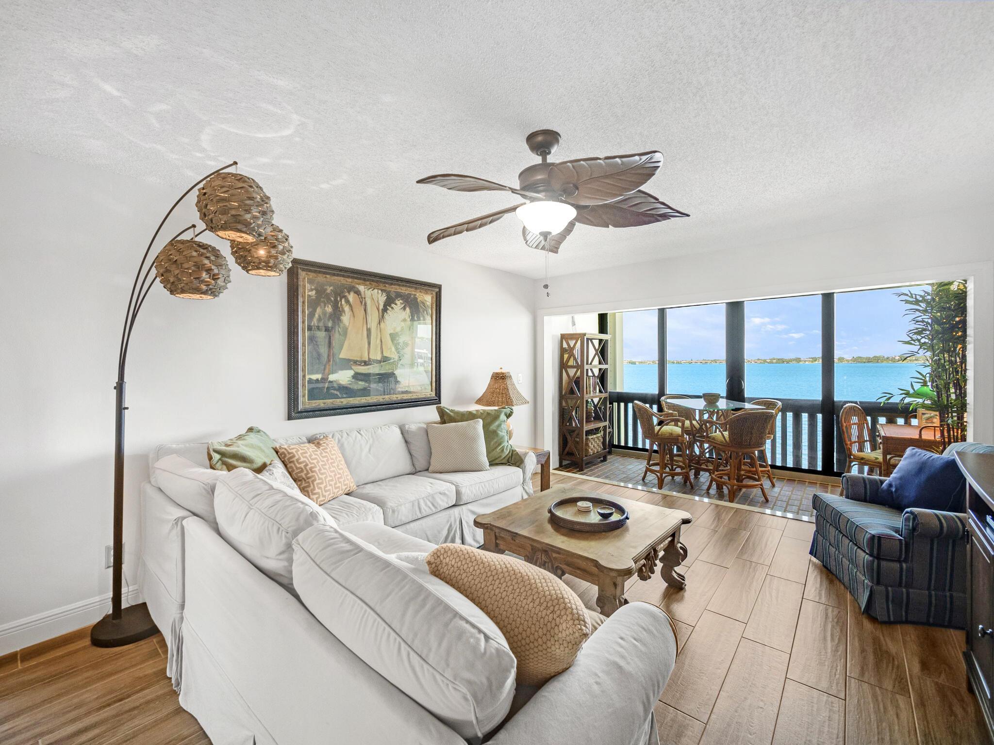 Live the lifestyle you've been dreaming of in this spectacular, end unit, wide-waterfront condo designed exclusively for adults 55+. Fully furnished with impeccable taste and available for a min 6-month seasonal stay--annual rental is preferred for those seeking a serene long-term escape. Every inch of this condo reflects quality and care. From top-of-the-line appliances to premium flooring and designer finishes, no detail has been overlooked. From the balcony, take in uninterrupted river views, where tranquil waters meet Florida's rich wildlife. Watch the boats drift by and enjoy daily sightings of pelicans, ospreys, and occasional dolphins, manatees, and fish frenzies right outside. Day dock available with possible long term docking, see the dock master. Kayak from Pierpoint's beach... "Walden Beach" and explore islands nearby, Manatee Pocke, or paddle to downtown Stuart. Bike storage is available for scenic rides to downtown Stuart and the Beaches. Whether you're looking for a seasonal retreat or a year-round sanctuary, this condo offers the perfect blend of luxury, comfort, and connection to nature&#x14;all within a vibrant, welcoming community. All information is deemed reliable, but not warranted by Agent or Agencies. Tenant to verify.