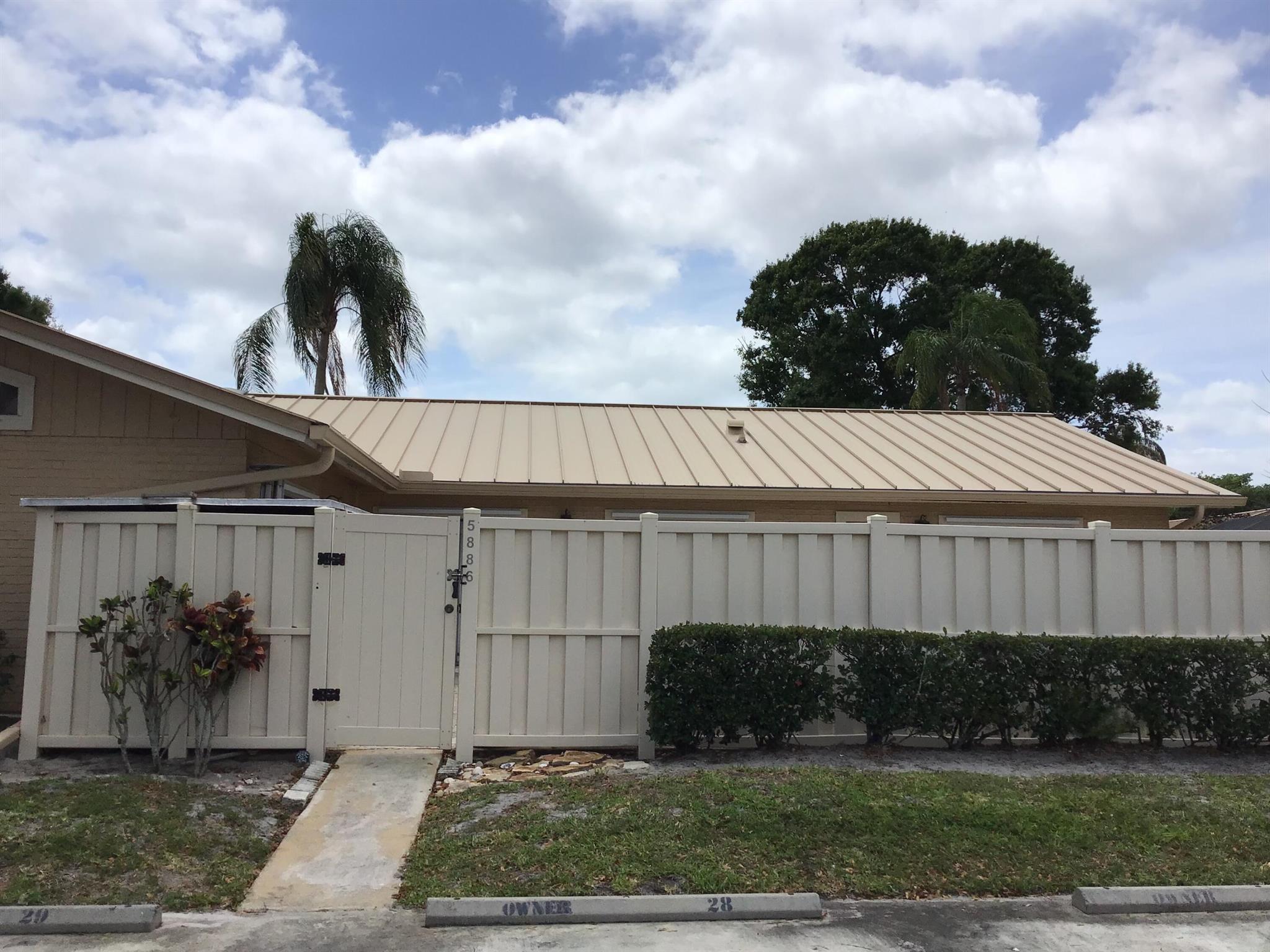 Location, Location, Location!  Beautiful Bright unit at the heart of Palm Beach Gardens. Spacious 3 Bed/2 Bath Townhome. Open Kitchen with granite counter tops,  Ceramic floors throughout the house, vaulted ceilings, and newer water heater and AC. Enjoy comfortable living and privacy with a big patio. Come make it your own. Enjoy tons of amenities such as Basketball, Tennis, Party room, Playground and others, just a few minutes from the mall, restaurants and beach... Don't miss this opportunity to live in one of the best locations in Palm Beach Gardens!