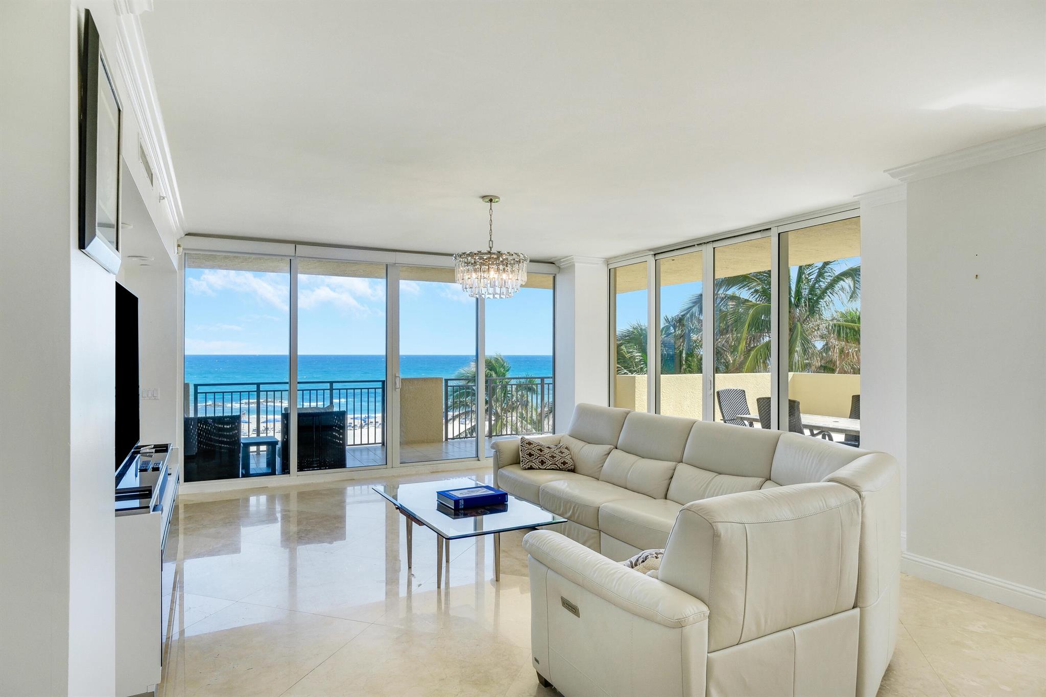 GREAT PRICE.The Marriott Resort and Spa offers you the opportunity to truly live a RESORT lifestyle. The views from this 4th floor unit make one feel vou are in a private beach house. Enjoy the HUGE 1500 Sa Ft SE wrap around ocean front balcony and terrace, elegant marble floors. and an open floor plan. all complemented by The Resort's world-class amenities. Indulge in three on-site restaurants. a full-service spa, fitness center. and two pools-including one with a waterslide! There's even a dedicated kids' club. As one of lust 66 exclusive Private Residences, with a separate entrance. full-time security. a billiard room. stvlish social spaces. a private outdoor grilling area. and even a movie theater. Don't miss this incredible opportunity! Furnishings negotiable.