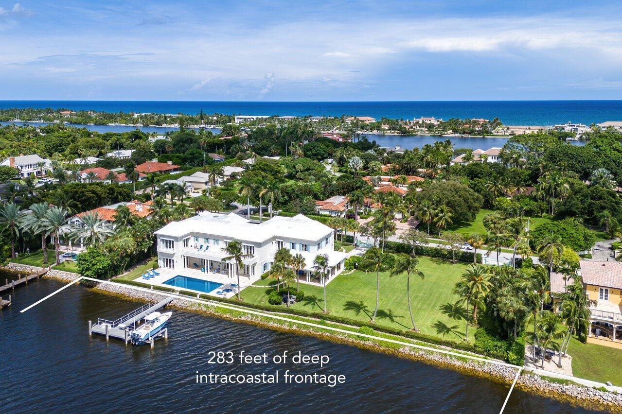 This is an unparalleled opportunity to own one of the largest intracoastal waterfront properties available from south palm beach to boca raton. Situated on over an acre of prime land on 2 lots, this expansive 12,000 sqft estate offers an incredible 282 ft of direct water frontage. With its magnificent scale and prestigious location, this home provides the ultimate in luxury living. Whether you're entertaining guests or enjoying quite moments by the water, the property offers unmatched privacy, breathtaking views and endless potential for customization.