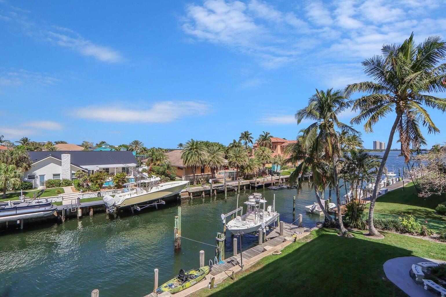 Boat slips available for sale or rent! This 2-bed 2-bath condo offers breathtaking Intracoastal & marina views & can be offered fully furnished/turnkey-boat slip rental available! Remodeled kitchen w/granite counters, stainless steel appliances & updated bathrooms. Tile & hardwood floors throughout. Tastefully furnished w/king beds, custom walk-in closet & new AC w/air sanitizing UV. The building was updated w/new exterior, concrete restoration & roof in 2025 w/no assessments. Just pack your suitcase--this stunning home is move-in ready! Walk to top-rated restaurants, parks, beaches & North Palm Beach CC. Unwind in the screened lanai, savoring the waterfront lifestyle. Resort-style amenities include heated pool, loungers, gas grill, kayak racks & extra storage. Live where others vacation.