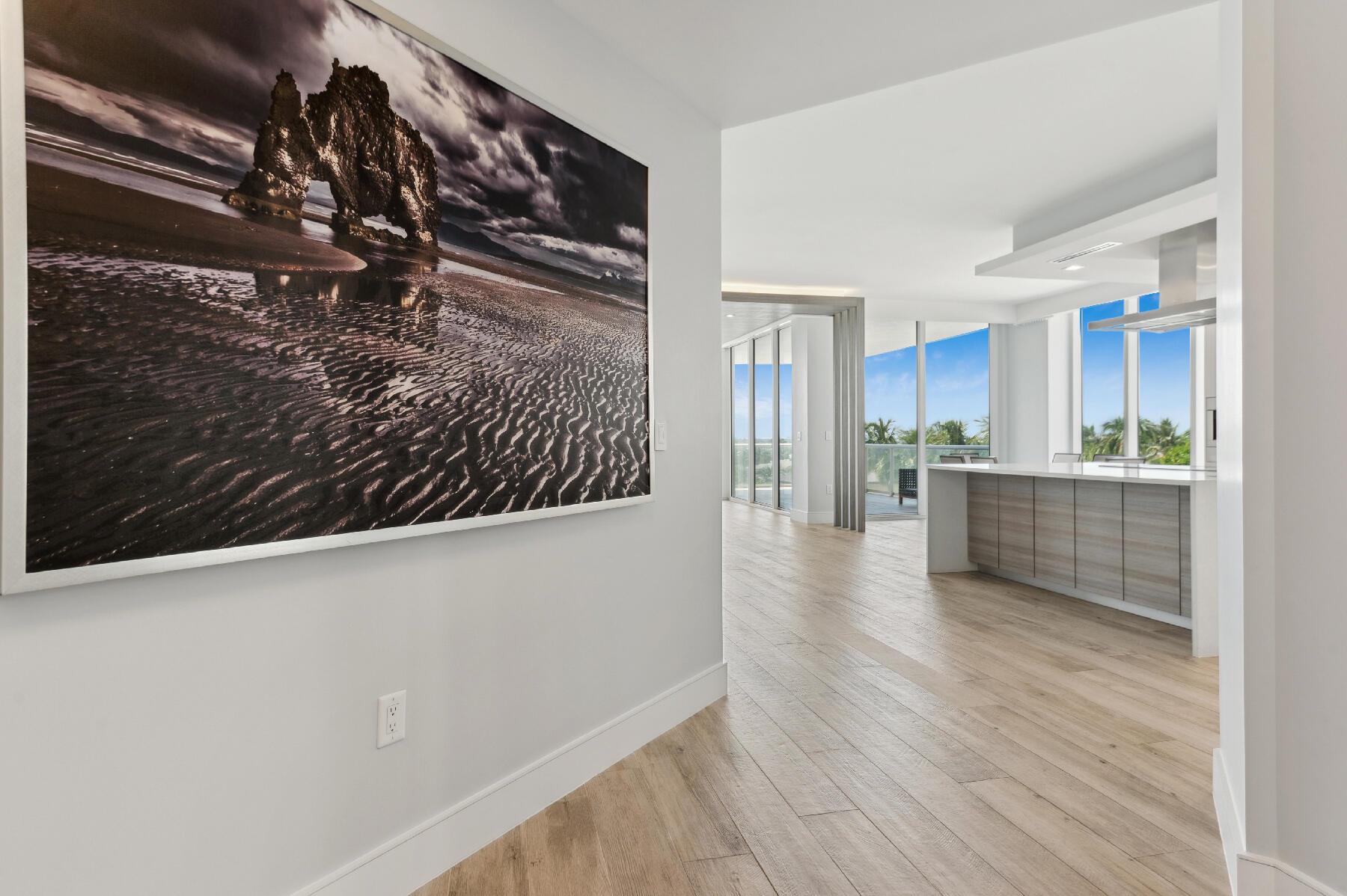 VistaBlue offers an unparalleled lifestyle with an exceptional array of luxury amenities. Enter through a secure, gated entrance and be greeted by a full-time concierge, ready to cater to your every need. The elevated pool terrace boasts breathtaking views of the Atlantic Ocean and features private cabanas, a serene spa pool, and an exclusive wine bar. Residents also enjoy access to a state-of-the-art fitness center, a sophisticated social lounge, a professional boardroom, and direct, private access to the beach.The former model residence is a showcase of refined design, featuring floating ceilings, custom-designed closets, and sleek Italian porcelain flooring throughout.