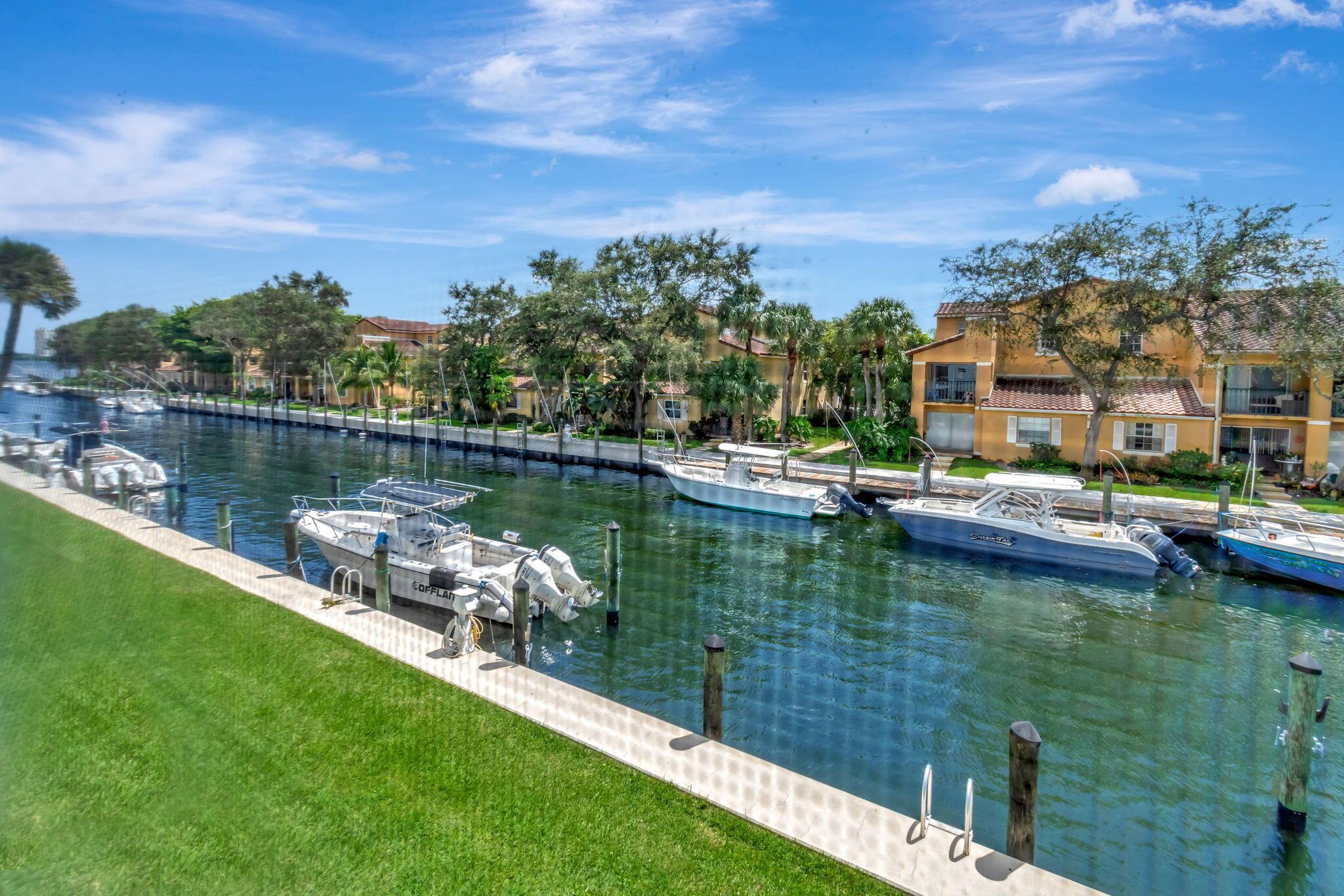 ** Can Lease Immediately***VACANT ON LOCK BOX!..SELLER FINANCING AVAILABLE!! Charming Waterfront Condo in a Boat-Friendly Community. NO FIXED BRIDGES!! Boat Slip Rentals Only $3/ft ***Breathtaking Peanut Islandis practically within swimming distance! This property is also an excellent investment, with area rents averaging $2,500. Experience serene waterfront living in the heart of North Palm Beach. This spacious 2-bedroom, 2-bathroom condo is nestled in a highly sought-after boat-friendly community, offering stunning canal views and an ideal coastal lifestyle. Community amenities include a sparkling pool, meticulously maintained grounds, laundry facilities, and assigned parking. 2018 A/C unit, and a 2021 water heater. See More -----> A Rated Schools!! This second-floor unit boasts a bright, open floor plan filled with natural light. The living and dining areas flow effortlessly, making it perfect for entertaining or relaxing. The kitchen features ample cabinetry and counter space, perfect for culinary enthusiasts. The main Bedroom offers a private en-suite bathroom and generous closet space, while the second bedroom can serve as a guest room, home office, or flexible space to suit your needs.
Step out onto your private balcony and enjoy picturesque water views, watching boats pass by and wildlife in their natural habitat. Situated just minutes from beaches, top-rated golf courses, shopping, dining, and the breathtaking Peanut Island&#x14;practically within swimming distance!

Don't miss out on this exceptional opportunity to own a slice of paradise. Perfect for year-round living, a vacation home, or a solid investment!