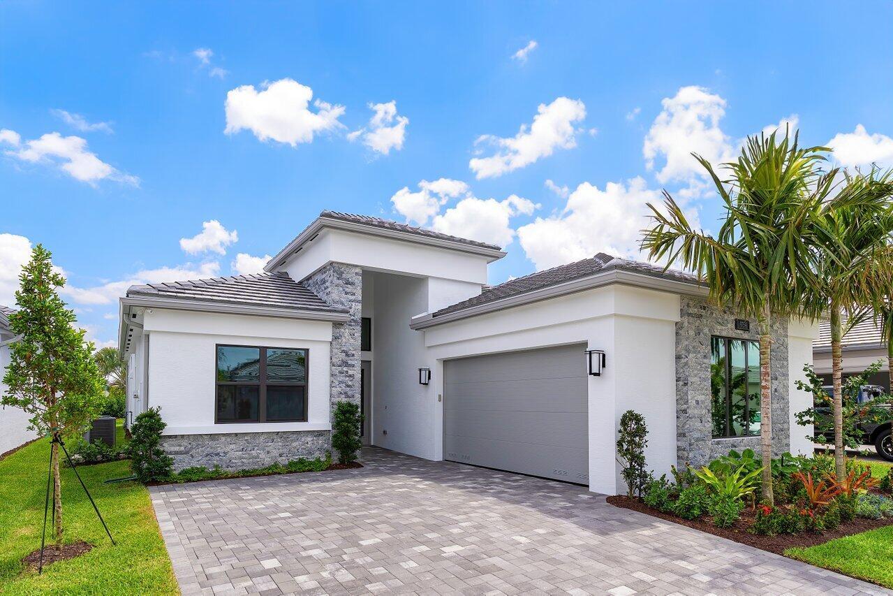 Be among the first to own this stunning, never-lived-in 2025 built home in the highly sought-after 55+ community of Valencia Grand.This spacious residence offers over 2,700 sq ft of living space, featuring 3 bedrooms, 3.1 bathrooms, a den, and a generously sized club/hobby room. Highlights include an extended paver driveway, screened lanai, and a sleek white kitchen with quartz countertops.Valencia Grand offers resort-style living at its finest, with world-class amenities, vibrant social events, and an unmatched lifestyle tailored for active adults. Don't miss this opportunity to step into brand-new construction without the wait. See Floor Plan