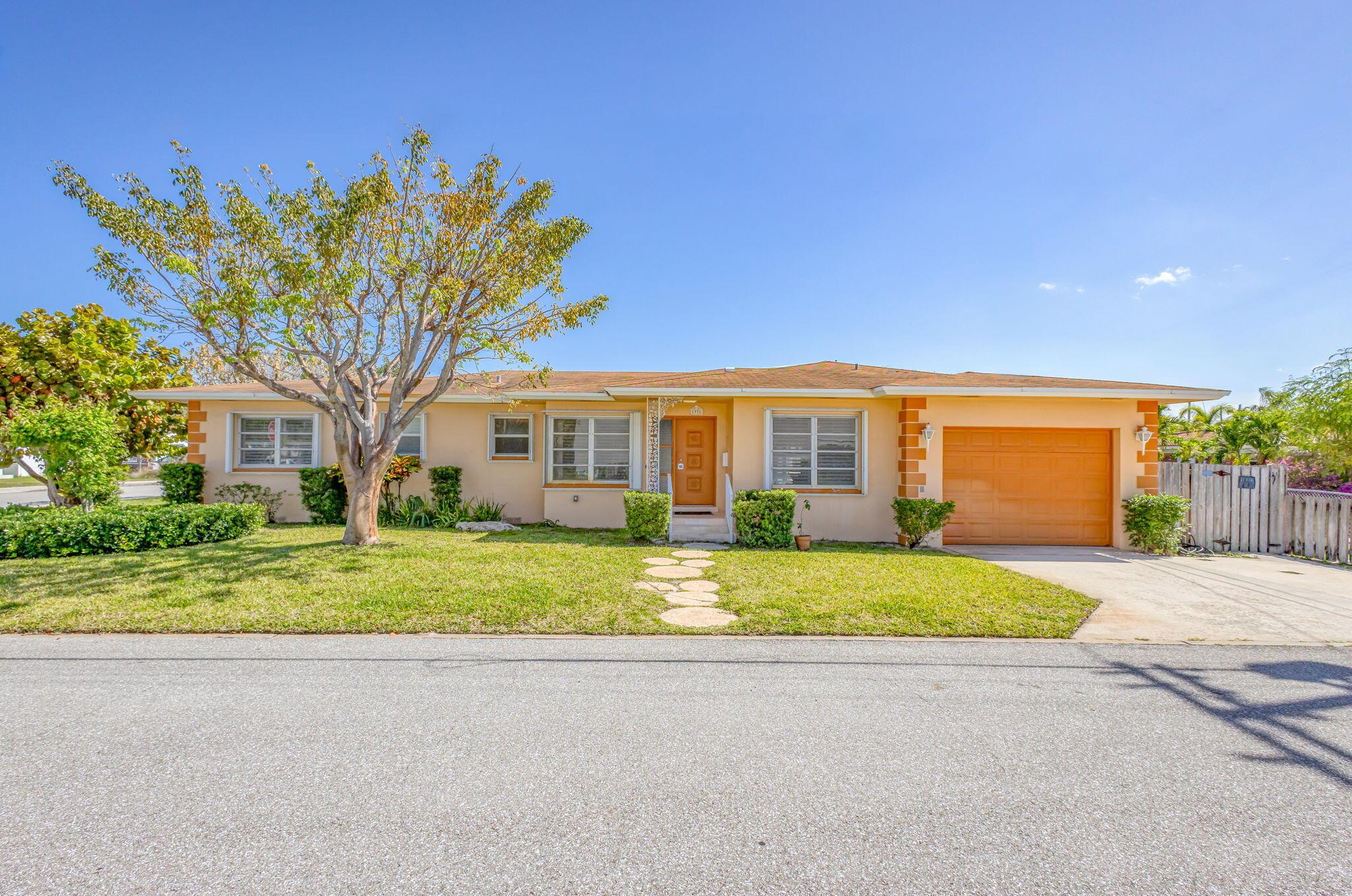 Located in the heart of Lake Worth Beach, this spacious 3 bedroom, 3 bathroom, pool home sits on a rare double corner lot with no HOA. The open living and dining areas flow perfectly for entertaining, and the office can easily become a 4th bedroom. Step out back to a fenced in yard with a 9' deep pool with a sun shelf. Spacious bedrooms with built in storage, large kitchen for entertaining, plantation shutters in every room and accordion shutters for storm protection and peace of mind! Less than a mile to the beach and I-95.  This home is full of potential and ready for your personal touch.Schedule your showing today!