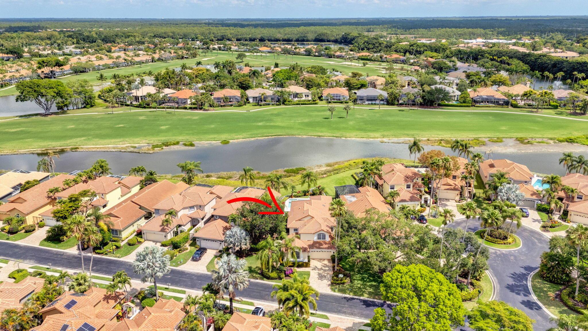 Looking for an UNBELIEVABLE view? Spend time in your private pool & spa while overlooking water and golf! A huge side yard with tons of orchids and plants greets you upon entering the courtyard gate. A gardeners paradise! Open and bright floorplan with almost 2,800 living square footage. Your primary bedroom and one guest bedroom are located on the first floor with an additional guest bedroom and loft upstairs. The home is protected with hurricane shutters, roof was replaced in 2014, pool pump 2024 and 2 A/C units from 2021. You won't find another single family home with a pool & spa and GORGEOUS water/golf views for under 1 million in Ibis. Don't miss your chance to make this home your own!