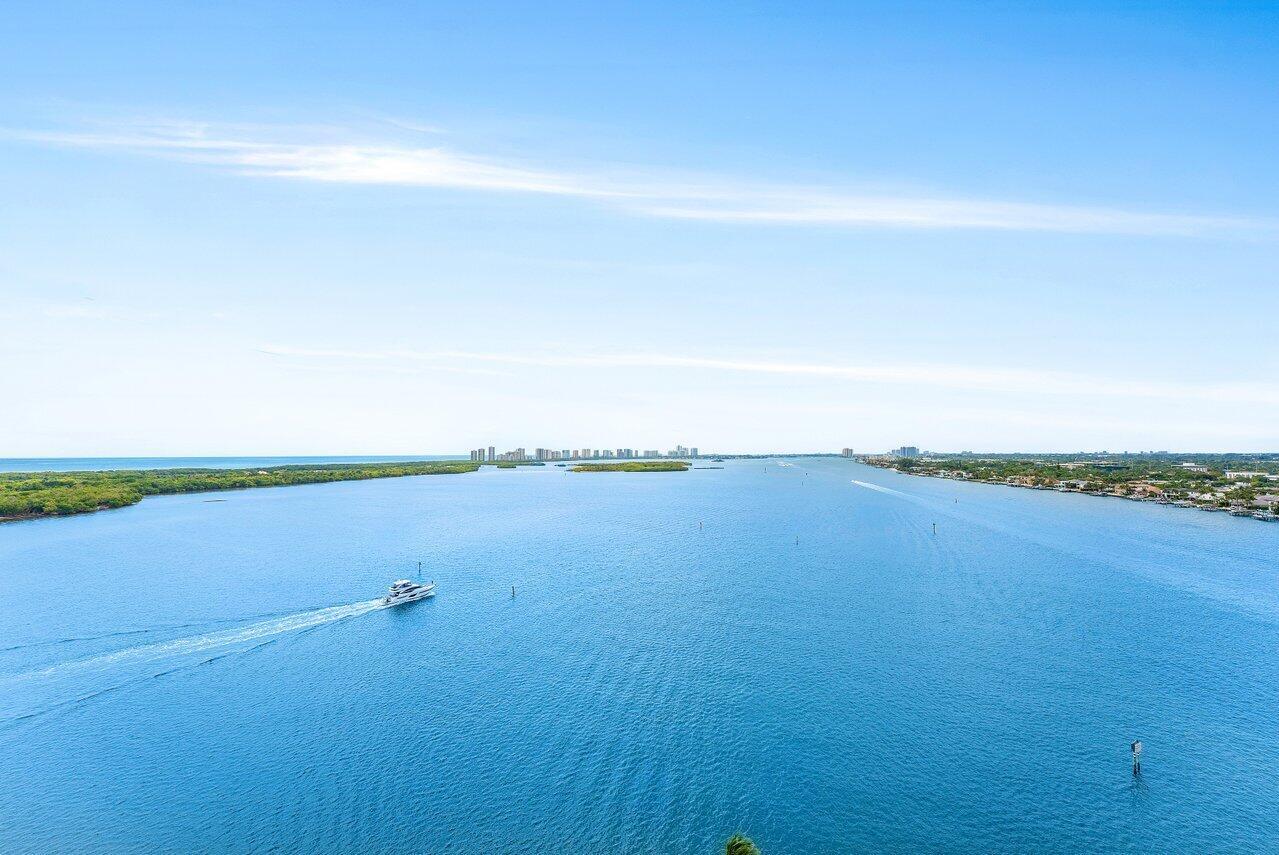 This rarely available 15th-floor residence at Lake Point Tower is located in one of Palm Beach County's most prestigious addresses.  Enjoy stunning, panoramic views of the Atlantic Ocean, Intracoastal Waterway, and Singer Island from every room, with floor-to-ceiling windows bathing the space in natural light. This spacious condo features two generously sized bedrooms, each with luxurious en-suite bathrooms, and offers the flexibility to add a den for extra versatility.Step onto your expansive wraparound balcony--perfect for watching incredible sunrises over John D. MacArthur Park or tranquil sunsets with boats gliding across the sparkling waters. This oversized outdoor retreat provides ample room for patio furniture, making it ideal for entertaining or relaxing while watching the marina's mega yachts.

Located at the tip of the Old Port Cove peninsula, this exclusive building offers resort-style living with a secure, sophisticated lobby, 24/7 concierge, and a manned gatehouse. Exciting upgrades are underway, including a stunning infinity-edge pool, spa, shaded cabanas, viewing terraces, a putting green, and meticulously landscaped grounds. The state-of-the-art fitness center will feature a private training room and sauna, elevating the lifestyle to new heights.

Beyond the building, enjoy a scenic 2-mile waterfront walking path, Safe Harbor Marinas, and an on-site restaurant. Just minutes away, explore world-class dining, pristine beaches, premier shopping, and the newly reimagined North Palm Beach Country Club, boasting a Jack Nicklaus-designed golf course, tennis courts, and a modern clubhouse. With a dedicated garage parking space, storage unit, and easy access to Palm Beach International Airport, this is the epitome of luxury and convenience.