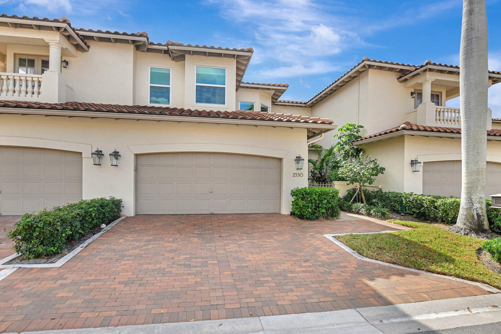 Great 4 bed family home at a great price. This townhome is in mint condition and beautifully designed. 1 st floor has living dining area with soaring ceilings and double height glass impact window and doors bringing in an abundance of natural light. there is a well designed cooks separate kitchen with stainless appliances and breakfast area also open to sliding impact doors and private backyard area with a hot tub and seating area. Also on primary floor is a full bath and 4th bedroom currently used as an office while housing a murphy bed. Up a beautiful staircase is the spacious primary bedroom and all new gorgeous primary bath with separate free standing tub and shower. There are an additional 2 beds that share a full second bath. home is walking distance to Broken Sound Clubhouse.