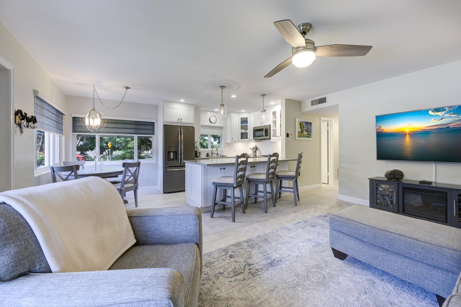 55+ community condo remodeled, redesigned and fully furnished first floor condo with great light, enclosed patio with water views of Lake Osborne. This corner unit has easy access with designated parking by the entrance. The community, with all its countless amenities, is ideally located next to Lake Osborne, i95, near the beach and all dining and shopping Lake Worth Beach has to offer. This condo is also offered for a seasonal rental at $4,475/mth.