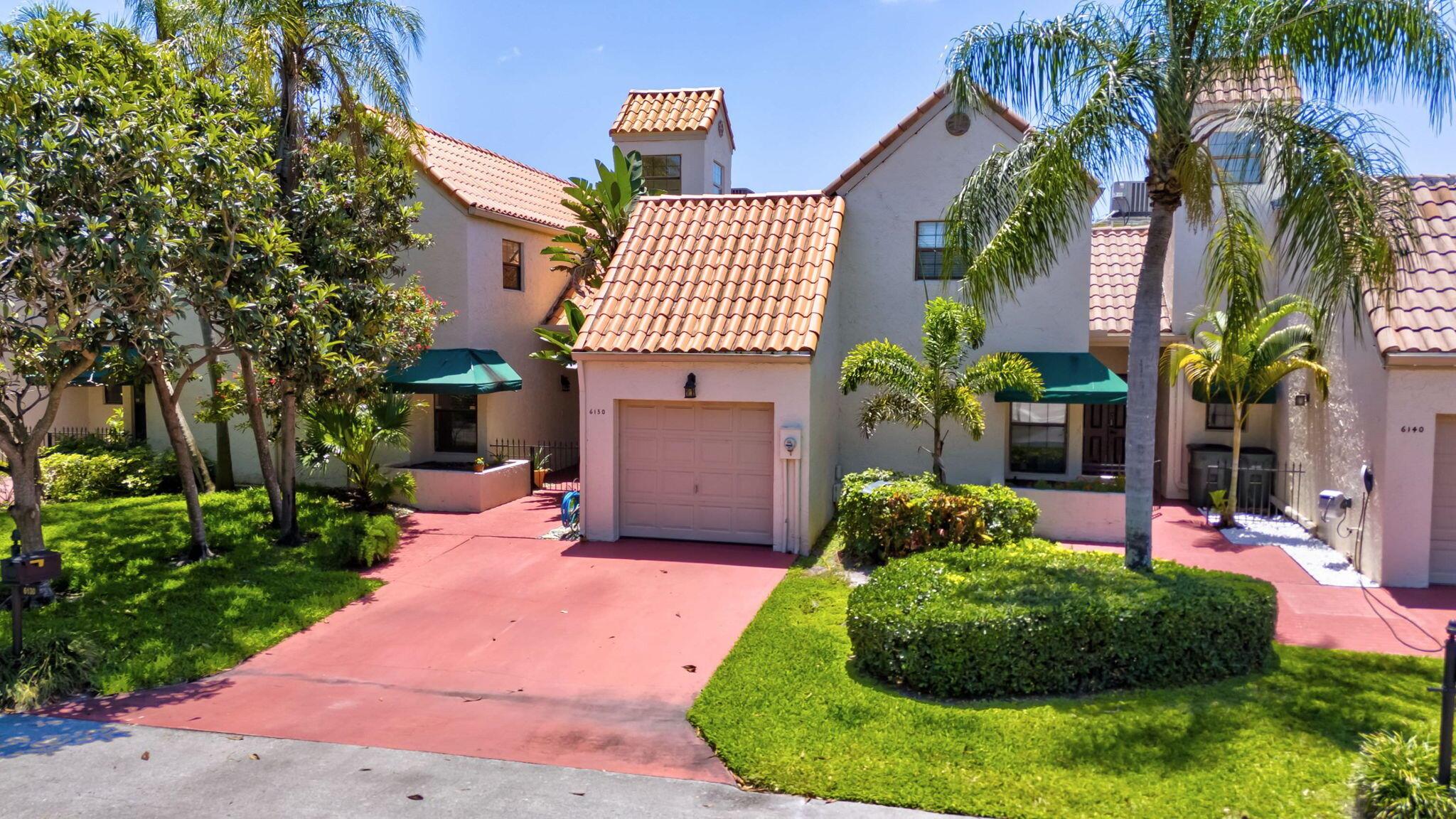 HUGE PRICE REDUCTION!  This lovely home offers an open-concept layout that flows effortlessly from the moment you step inside to the spacious, screened-in patio. You'll find luxury finishes throughout--Saturnia marble flooring, Upscale built in fridge in kitchen and elegant natural wood ceilings that expand to the top of the second floor. Impeccable elegance and modern convenience come together in this meticulously maintained home. The location? Exceptional! Just steps from the Boca Town Center Mall.  With wonderful shops and restaurants, and only the BEST schools in all of Boca Raton.   The master suite is luxurious with a walk in dressing room that's a room on it's own.   Make an appointment to see it today!  All offers welcome!