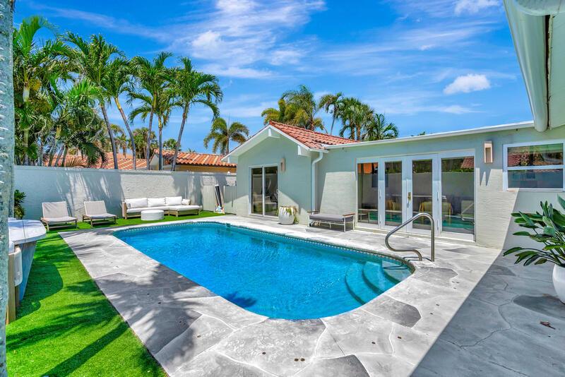 Located in the beachfront gated community of Ocean Walk, this bright home with open floorplan is not to be missed!  Beautiful kitchen off of the living and dining area. Four bedrooms (three ensuite) and Four bathrooms. Great entertaining space out back with pool and built in kitchen. Impact rated doors and windows, walk in closets, laundry room. You can feel the ocean breeze right from your backyard!