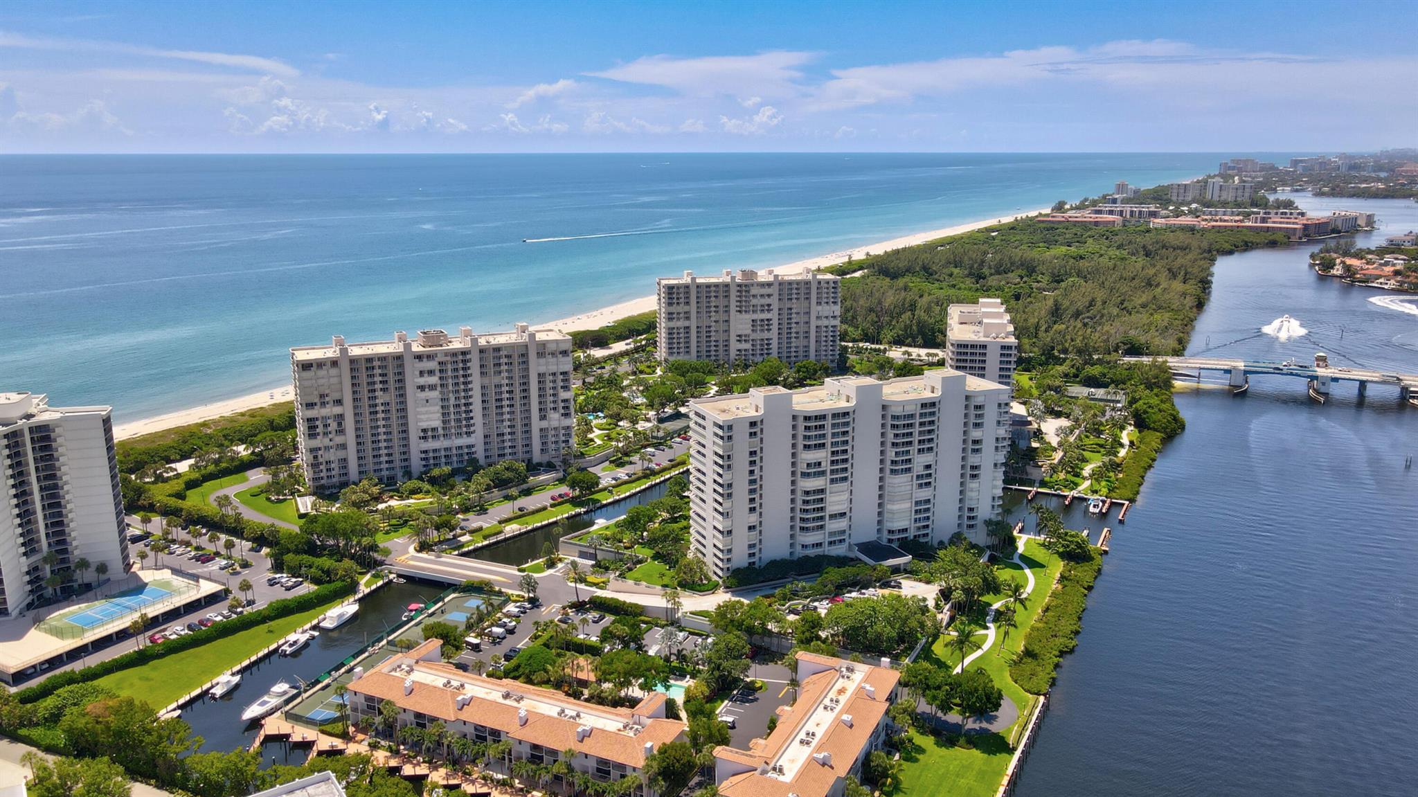Great value on A1A with private beach access! Enjoy marina and garden views -- and soon, views of the completely new pool deck -- from the expansive balcony, accessible from every room. The new owner will get to enjoy a completely new pool deck and brand-new lobby, as the building is currently undergoing concrete restoration and amenity enhancements. This light-filled residence features impact windows and doors, a split floorplan with two en suite bedrooms, and a kitchen with granite countertops and stainless steel appliances. The primary suite offers a walk-in closet, dual vanity, soaking tub, and glass-enclosed shower. Rent includes garage parking, cable, and internet. Located within the prestigious Sea Ranch Club of Boca, set on 38 lush acres with waterways and marina access. Amenities include 24-hour manned gate, concierge, security patrol, private beach with lounge chairs, resort-style pool, hot tub, fitness center, party room, library, card room, tennis courts, pickleball, putting green, car wash station, and boat marina.