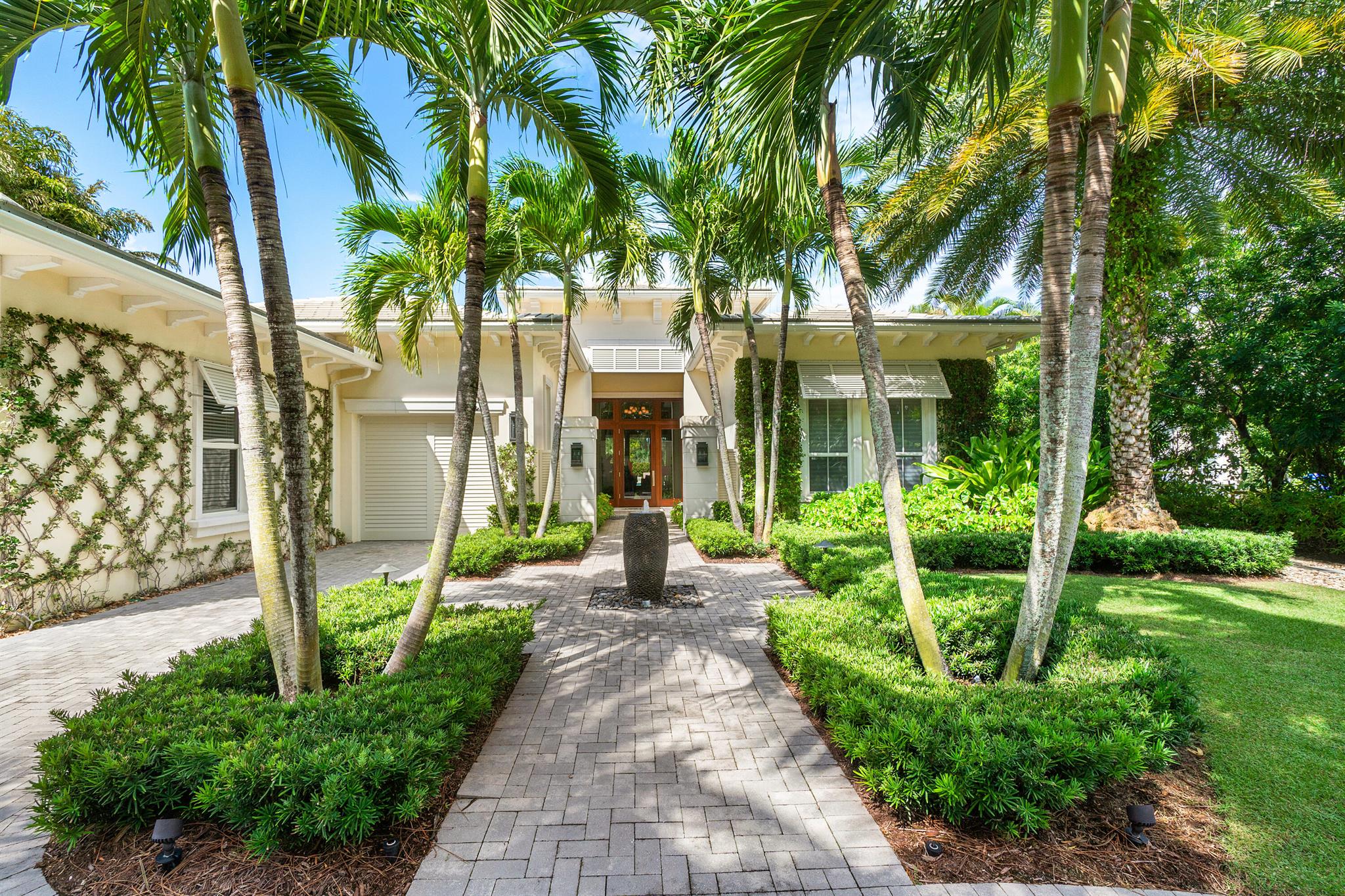 Discover the exquisite home from former builder Mustapick Estate Homes, now available ! Nestled on a picturesque 1/3 acre lot, this stunning residence offers breathtaking views of the 10th fairway in the highly desirable Isle Estates. Step inside to an inviting open great room, perfect for entertaining, featuring a spacious bar and a versatile study/club room. The kitchen is a culinary dream, bathed in natural light and boasting a large island and cozy breakfast area. Retreat to the expansive master suite, complete with a morning bar, a comfortable sitting area, and a luxurious master bathroom that exudes elegance. The backyard is an entertainer's paradise, ideal for alfresco dining and gatherings, showcasing a covered lanai and a summer barbecue area. Old Palm has an 18-hole championship golf course completely re-designed by Raymond Floyd, with a separate 3 hole practice facility. A new completely renovated clubhouse with 1 bedroom casita's, restaurant, bistro, cafe, fitness center, lap pool, kids club and mens and women's spa. Beach Club is available.
Old Palm Golf Club is one of the most desired
golf course choices surrounded by luxury homes.