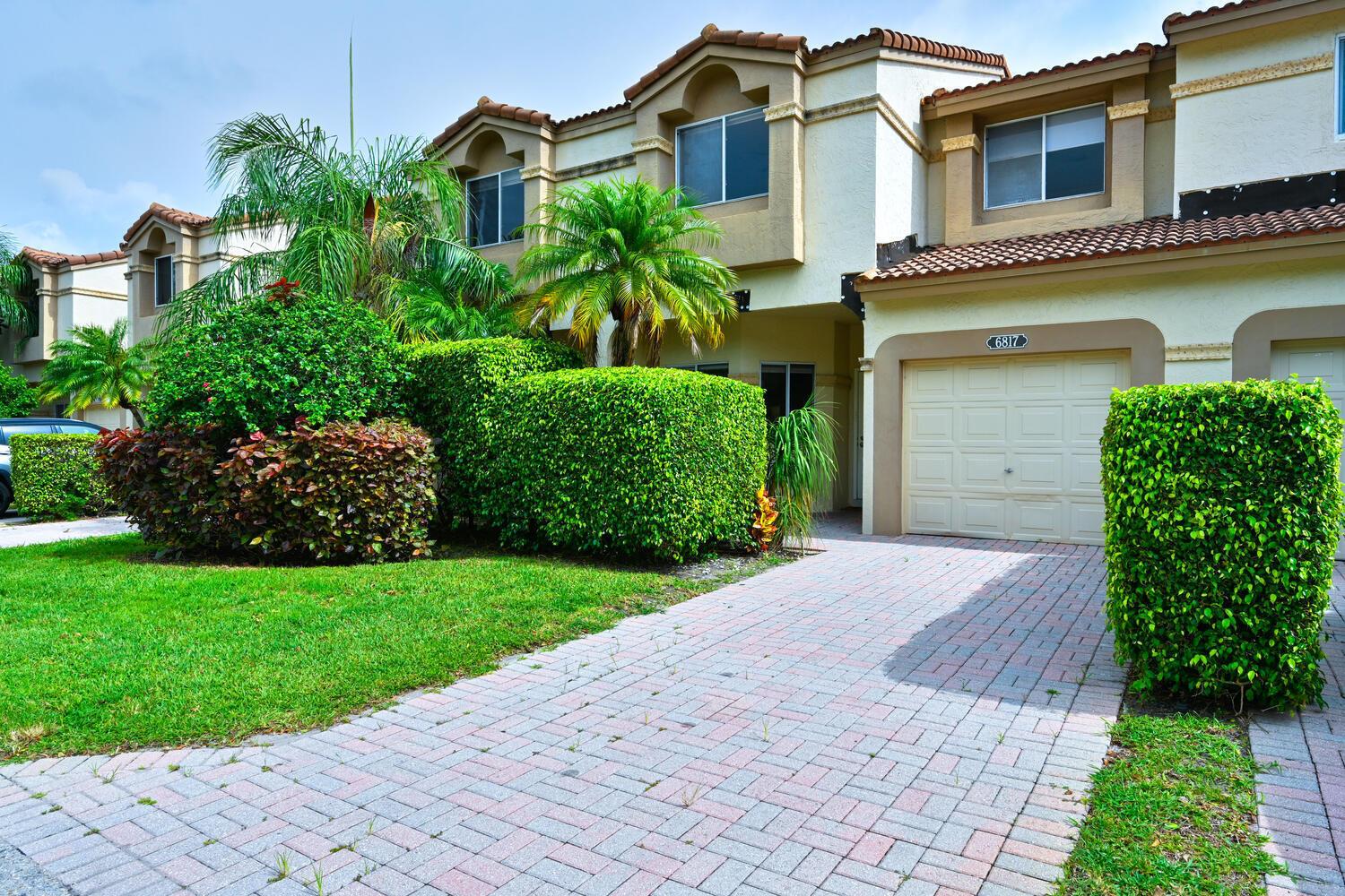 Recently upgraded with high end finishes town house located in highly desirable Boca Pointe. Open kitchen, breakfast area and expansive living room with beautiful lush tropical garden views. Large bedrooms, upgraded bathrooms, large windows and skylights that bring incredible light into this majestic home. This gated community is located in the heart of Boca Raton with easy access to i95, Turnpike and major central establishments such as the Town Center Mall, Mizner Park and the beaches.