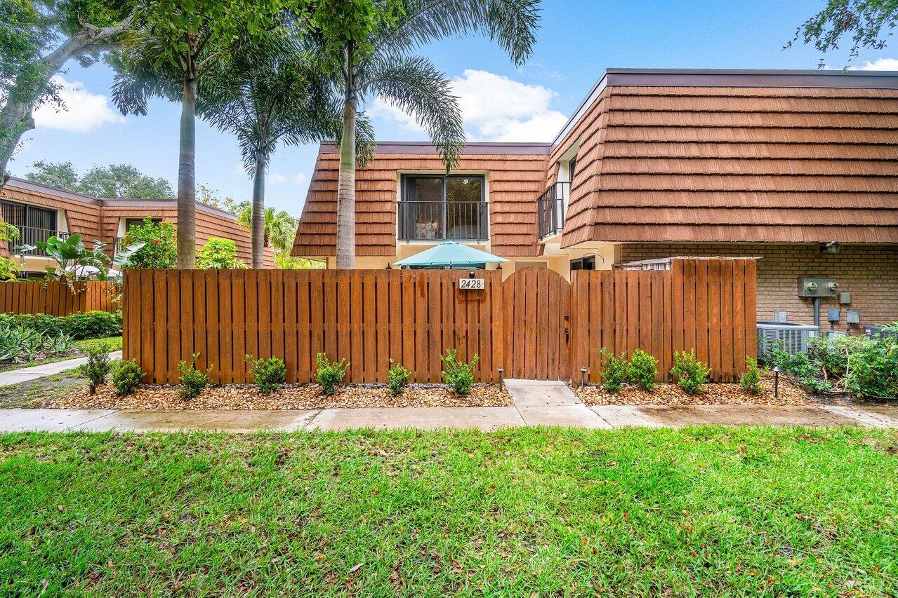 This beautifully renovated home, ideally located between the Intracoastal and Jupiter Beach/Juno Pier, offers luxurious coastal living just steps from resort-style amenities like a pool, tennis, pickle ball, and basketball courts. Inside, you'll find fresh paint, new baseboards, shiplap and box wall accents, and a modern kitchen with granite countertops, white shaker cabinets, custom lighting, and newer stainless steel appliances. All three bathrooms have been fully remodeled, with added upgrades including new closet doors, ceiling fans, and light fixtures. Hurricane impact sliders and a new front door ensure peace of mind, while the private courtyard--with professional grade landscape lamps that double as tiki torches--offers an inviting space to relax or entertain. This is a ONE OF A KIN