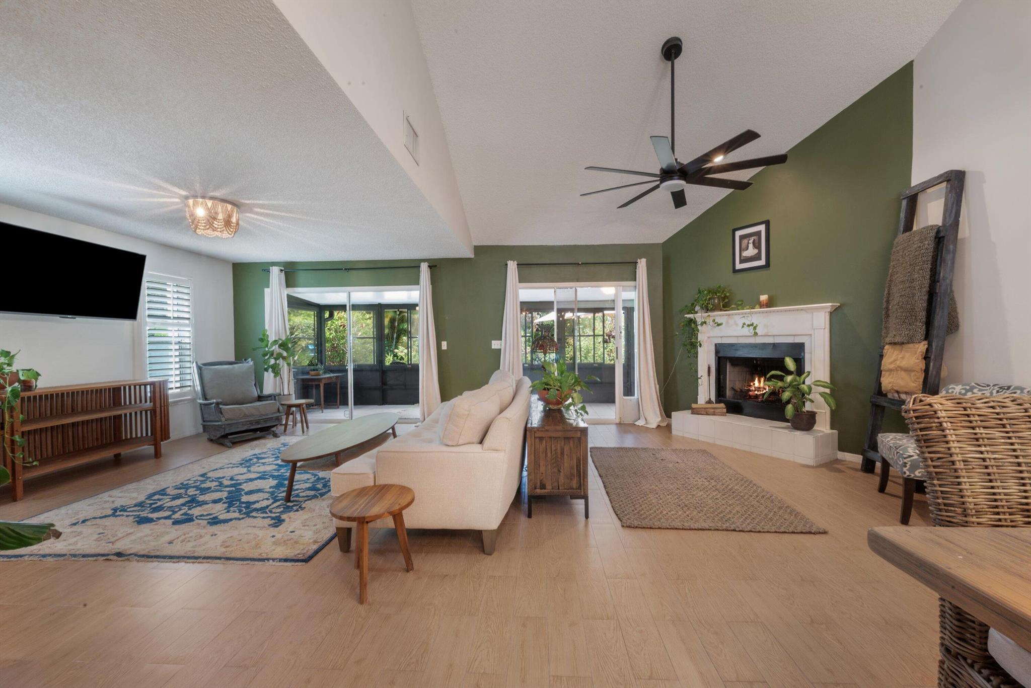 Discover this one-of-a-kind ''Unique'' Open floor plan in Holly Creek! The perfect space awaits you to entertain family & friends. The relaxed ambience & style of the interior gives homage to the Artist within- The ''Great Room'' design flows naturally to the private screened porch with relaxing garden & preserve views. A wood- burning fireplace, a cozy alcove, warm & neutral paint tones throughout plus an inviting modern-day kitchen. The main level Bedroom suite is complemented by another full Bedroom suite on the second level with a loft PLUS a ''secret'' Walk-in-closet. The Community offers a Social Clubhouse with Swimming Pool, Tennis & Pickel Ball Courts. The HOA dues include Basic Cable, High Speed Internet plus Lawn &amp; Irrigation Maintenance. 2 Pets up to 40lbs each are allowed plus small trucks are welcome. Close to everything + Martin County Schools, the Intracoastal Waterway &amp; Hutchinson Island Beaches. Quick close+ Furnishings negotiable.