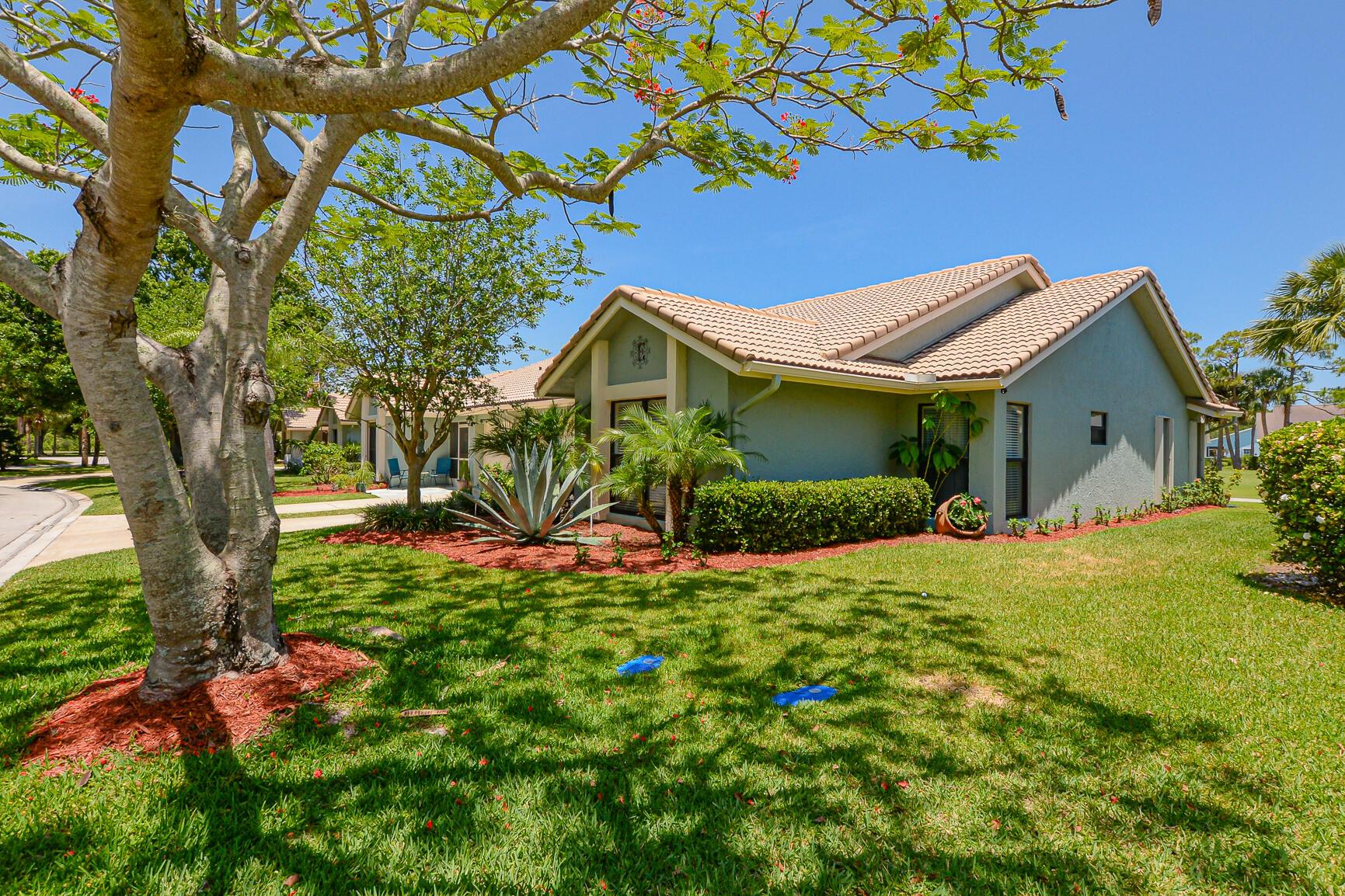 Absolutely fabulous Villa at Gator Trace all RE-DONE & Beautiful on the 5th hole of Gator Trace golf course. Features CBS Construction, updated roof in 2008, 3 Bedrooms, 2 Baths, 1 Car Garage & extended floor plan. Vaulted ceilings, tile throughout, crown molding, Details include Impact windows, sliders with accordion shutters & extended concrete patio on the golf course & distance lake view. Stunning custom eat in kitchen with cherry wood cabinets, custom molding, updated lighting, quartz counter tops & breakfast bar. This Home has been re-plumbed,  new electric & lighting throughout.  Primary Suite has attention to details & gorgeous Master Bath with spacious spa like shower system, dual sinks & closet includes wood shelving. This home shows like a MODEL! Must See!