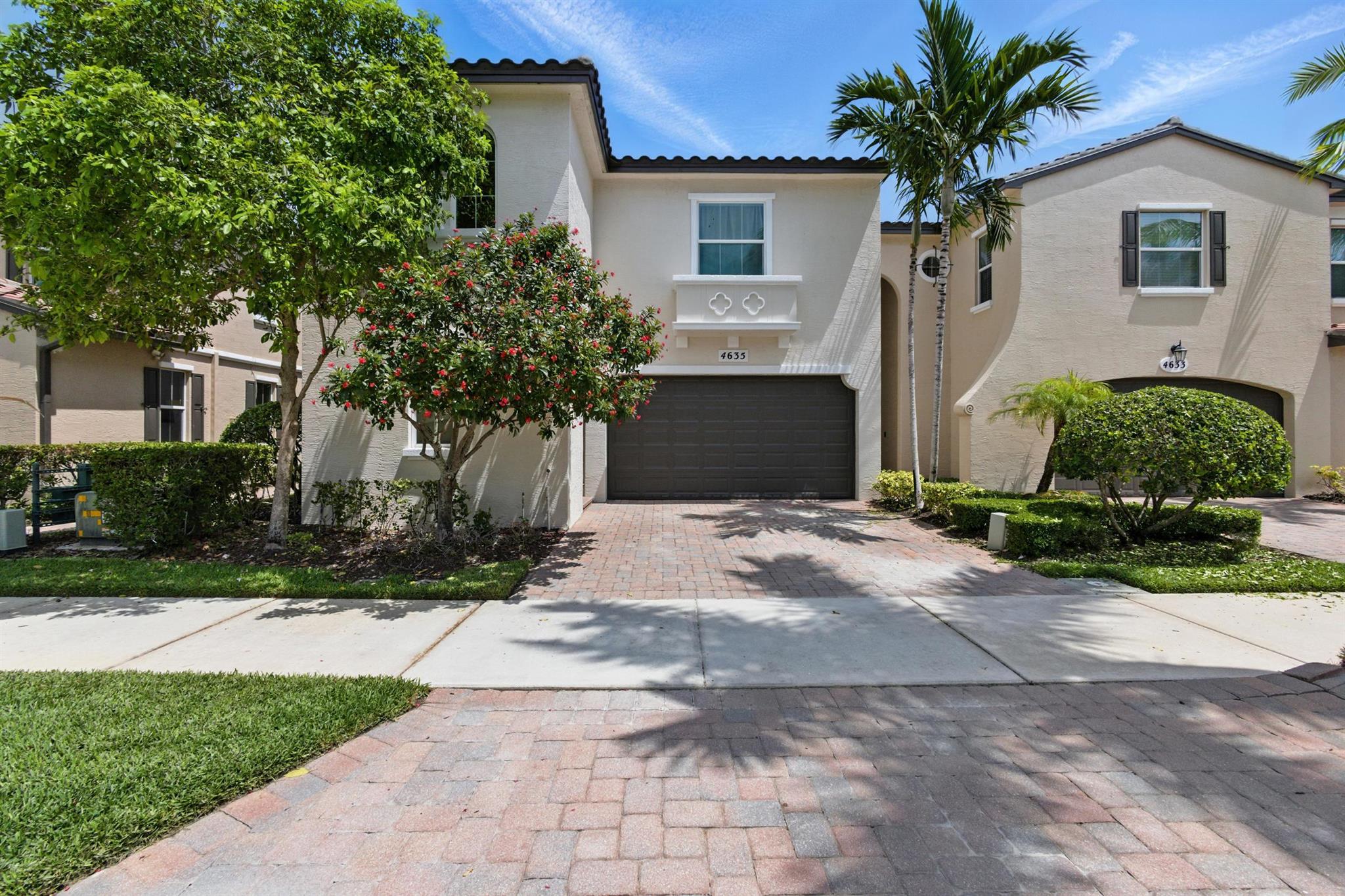 Discover this stunning 3-bedroom 3 Bath 2 Car End Unit Townhouse situated in the lively community of Palm Beach Gardens. Combining contemporary style with thoughtful craftsmanship, this home provides an ideal balance of comfort and elegance. Step inside to a spacious living area filled with natural light and sleek finishes. The open-concept layout seamlessly connects the living room, dining area, and kitchen--perfect for entertaining or relaxing. The first-floor master suite offers a private, serene retreat with a luxurious ensuite bathroom and ample closet space. Upstairs, you'll find two more bedrooms, ideal for family or guests, complemented by additional bathrooms and versatile living space.