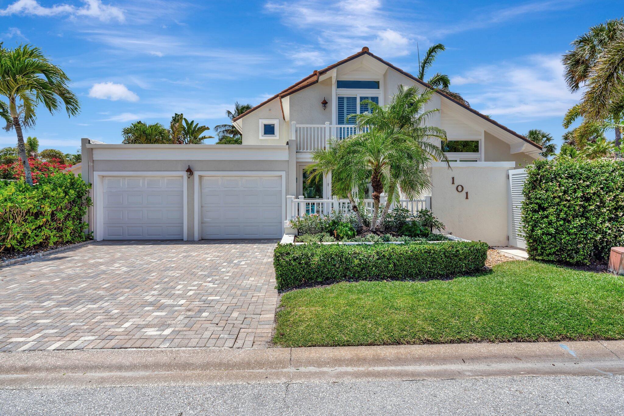 Beautifully expanded & thoughtfully upgraded home just steps from the beach in Jupiter's gated community of Ocean Walk. This 3-bedroom, 3-bath residence offers over 2,260 sq ft under air & features a private saltwater pool, impact-rated windows and doors, and stunning hand-scraped European white oak floors throughout. Extensively renovated in 2013 with structural, mechanical, and designer upgrades including a reconfigured entry, upgraded electrical & copper plumbing systems & a fully sound-insulated interior. In 2019, the dual-zone HVAC system was replaced &  now features 2024 HEPA filtration & 2024 200 amp electric panel. The kitchen includes custom shaker cabinetry, granite countertops, and Bosch/GE Monogram appliances. Luxurious primary bath features trending Pistachio marble vanities marble vanity, frameless glass shower, and custom inlaid marble tile. Additional highlights include a travertine patio, lush tropical landscaping, a fire pit, and landscape lighting that showcases an orchid garden. Ocean Walk is a pet-friendly community with direct beach access and close proximity to Carlin Park, Jupiter Dunes Golf Club, and Harbourside Place. A rare opportunity to live in one of Jupiter's most desirable walk-to-beach neighborhoods.