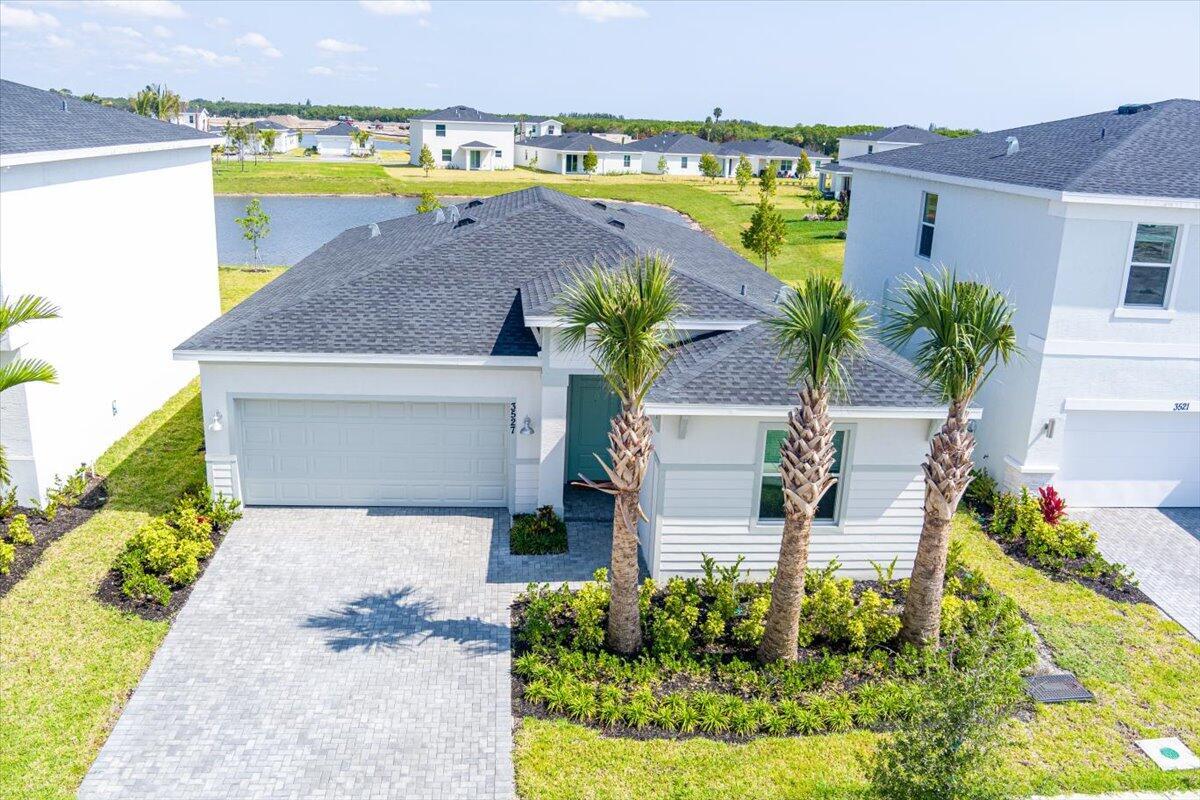 This charming single-story home offers an open-concept living space complete with a Great Room, dining room and kitchen that connect directly to a covered patio. The owner's suite is thoughtfully designed for maximum privacy, while down the hall are three bedrooms arranged near a convenient full-sized bathroom. A versatile two-car garage provides storage space. Homeowners will have exclusive access to an assortment of lavish amenities including a swimming pool, clubhouse, community gardens and sports courts. Seagrove is minutes to water-borne activities in Vero Beach and tons of shopping and dining options in downtown Fort Pierce. Visit the 340-acre Fort Pierce Inlet State Park for surfing, fishing and snorkeling.