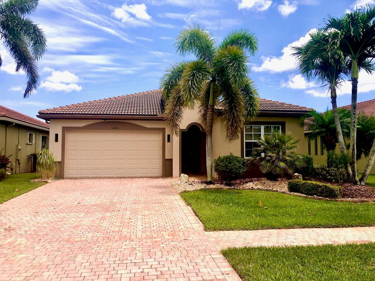 THIS HAS TO BE ONE OF THE FINEST HOMES UNDER 1 MILLION DOLLARS IN SOUTH FLORIDA. THIS BEAUTIFUL CONTEMPORARY GEM IS ON A PEACEFUL LAKE LOT. THE INTERIOR OF THIS SPECIAL HOME HAS BEEN TASTEFULLY REMODELED, TO A VERY HIGH STANDARD OVER THE LAST YEAR. IT HAS ALL THE BELLS AND WHISTLES.  IMPACT WINDOWS, WHOLE   HOUSE GENERATOR, NEW DESIGNER KITCHEN, NEW APPLIANCES, NEW BATHS, HUGE QUARTZ ISLAND AND THE KITCHEN HAS FLOOR TO CEILING CABINETS FOR THE BEST GOURMET COOK! THIS IS LOCATED IN THE HOT NEWER AREA OF DELRAY NEXT TO ATLANTIC AND ST RD 7.  IT IS CONVENIENT TO SHOPPING, DINING, MOVIES.  AND HOA INCLUDES LAWN CARE, CABLE, COMMON AREA AND EXTERIOR MAINTENANCE, TRASH REMOVAL, PLUS MUCH MORE.  BUYERS SHOULD VERIFY ALL INFO. THE LISTING IS SUBJECT TO ERRORS, OMISSIONS AND CHANGES AT ANY TIME.