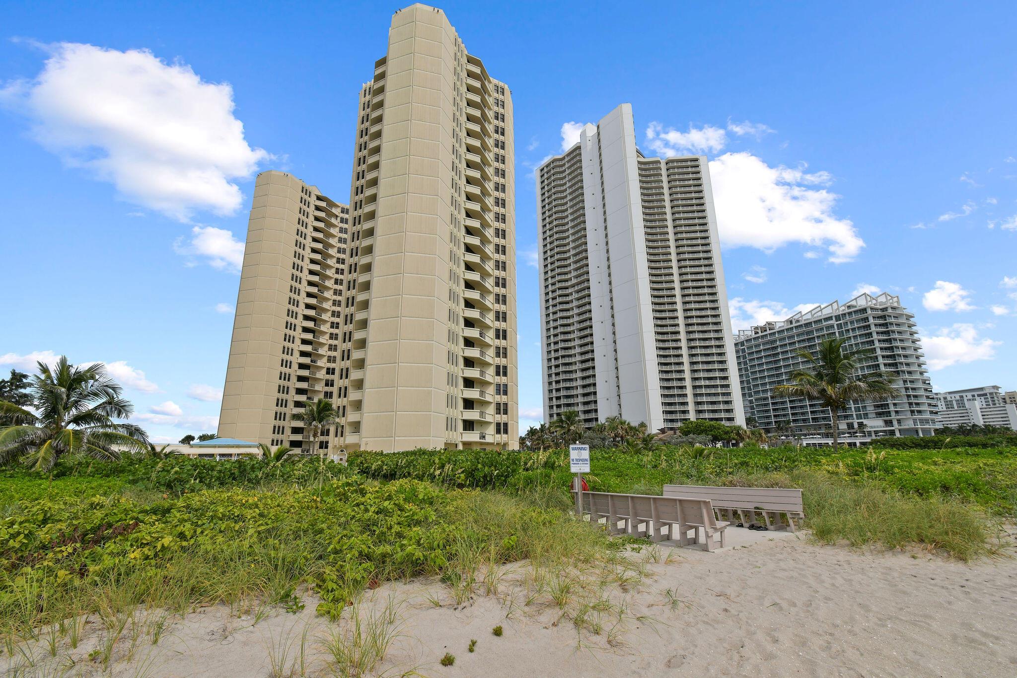 Unparalleled penthouse living with sweeping ocean views. Welcome to Phoenix Towers on the coveted shores of Singer Island, where this stunning 2-bedroom, 2-bathroom penthouse condo delivers breathtaking expansive ocean views that stretch for miles. Perched high above the coastline, complete with custom made black out shades, this rare offering combines serenity, luxury, and unbeatable location. Enjoy private beach access, a sparkling pool, fitness center, and a well-appointed clubhouse -- all overseen by an onsite manager for peace of mind. Whether you're soaking in the sunrise from your private balcony or heading out for a morning jog along the sand, every day here feels like a getaway. Located just 1/4 mile from popular restaurants, breakfast diners, and local bars, you'll have the best