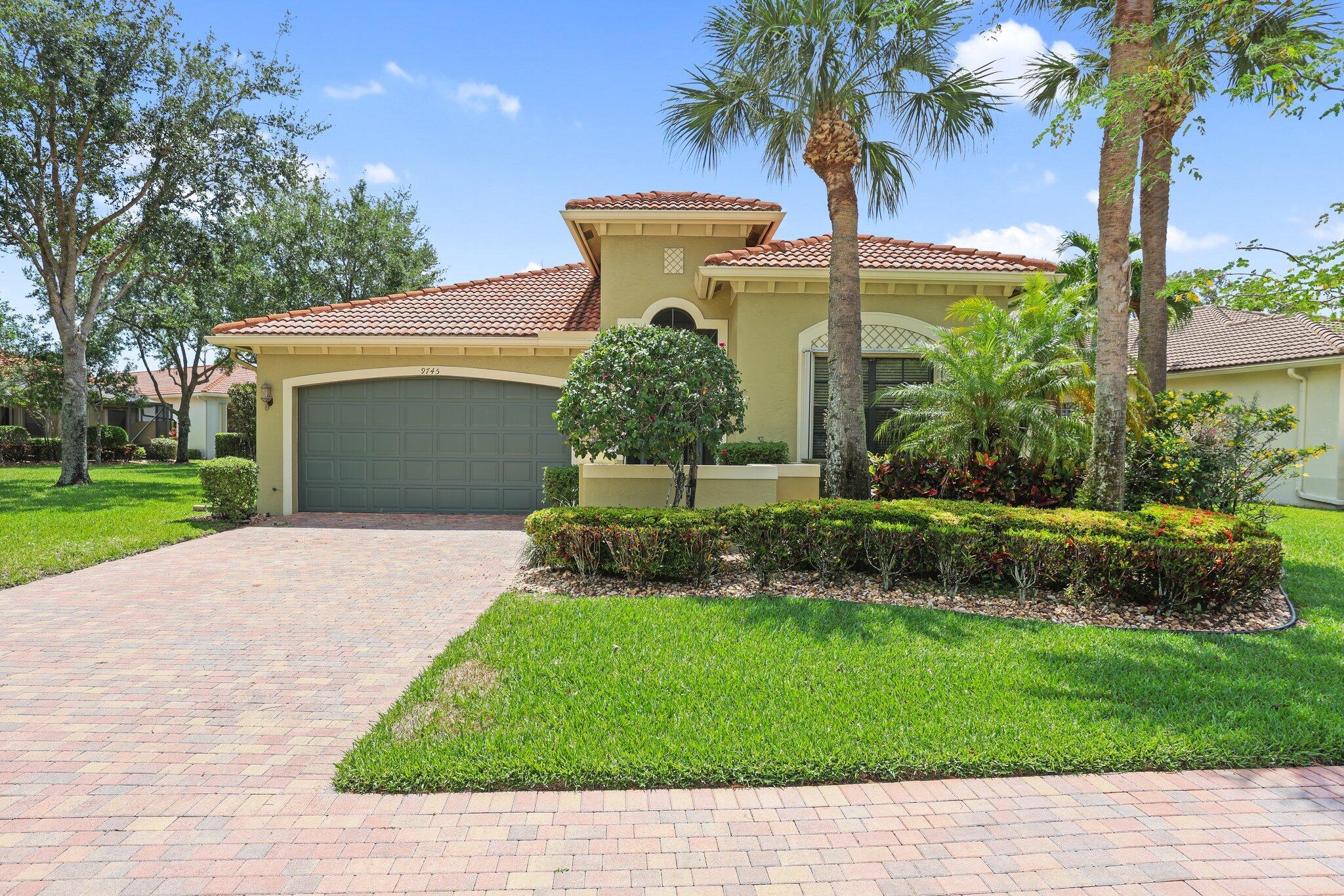Welcome to 9745 Isles Cay Drive in the sought-after Four Seasons! This professionally staged and furnished home is move-in ready, featuring a spacious open layout, soaring ceilings, warm tones, and elegant updates. Enjoy your private screened-in pool--a rare feature--overlooking the best long lake view with southeast exposure for all-day sun. Perfect for relaxing or entertaining with family. The home offers a great layout and an immaculate primary suite with walk-in closets. Walk to the newly renovated clubhouse, gym, and active pickleball & tennis courts. This is a very active community with sports, entertainment, and card games. Resort-style amenities include pools, hot tubs, and more. Flexible 3rd bedroom makes a great den or office. Just a short drive to downtown Delray. Welcome Home!