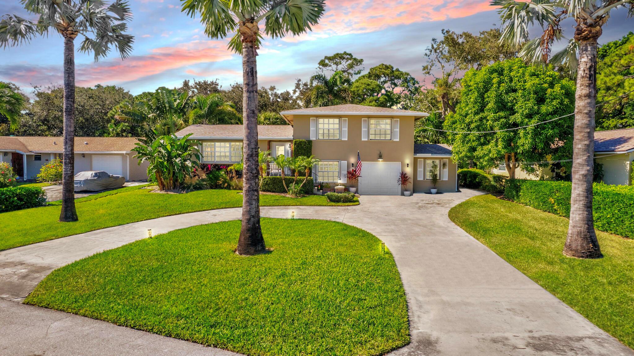 Discover this beautiful 4BR, 2.5 BA pool home in the highly sought-after Paradise Port coastal community, just one mile from the beach! Situated in an exclusive NON-HOA intracoastal neighborhood surrounded by luxurious, million dollar homes along scenic finger canals, this property is a rare find. Highlights include welcoming curb appeal, circular driveway, roof 2023, accordion shutters, 2024 impact garage door, outdoor shower, pool & fire pit w/ complete paver brick deck, stainless steel appl., 2023 ext.paint, large extra bonus storage area, Back yard is ideal for outdoor living & entertaining, offering a covered patio area perfect for pool parties or simply unwinding in your own private oasis. This home is unique w/ the split level floorplan. We can't wait for you to see it! Split floor plan is as follows: First floor is one car garage and includes a storage area (plenty of room for storage, gym, or could be converted into office or second car garage) and 1 full bedroom w/ closet &amp; half bath. Second Floor is living area w/ open kitchen and third floor are three bedrooms including primary bathroom.