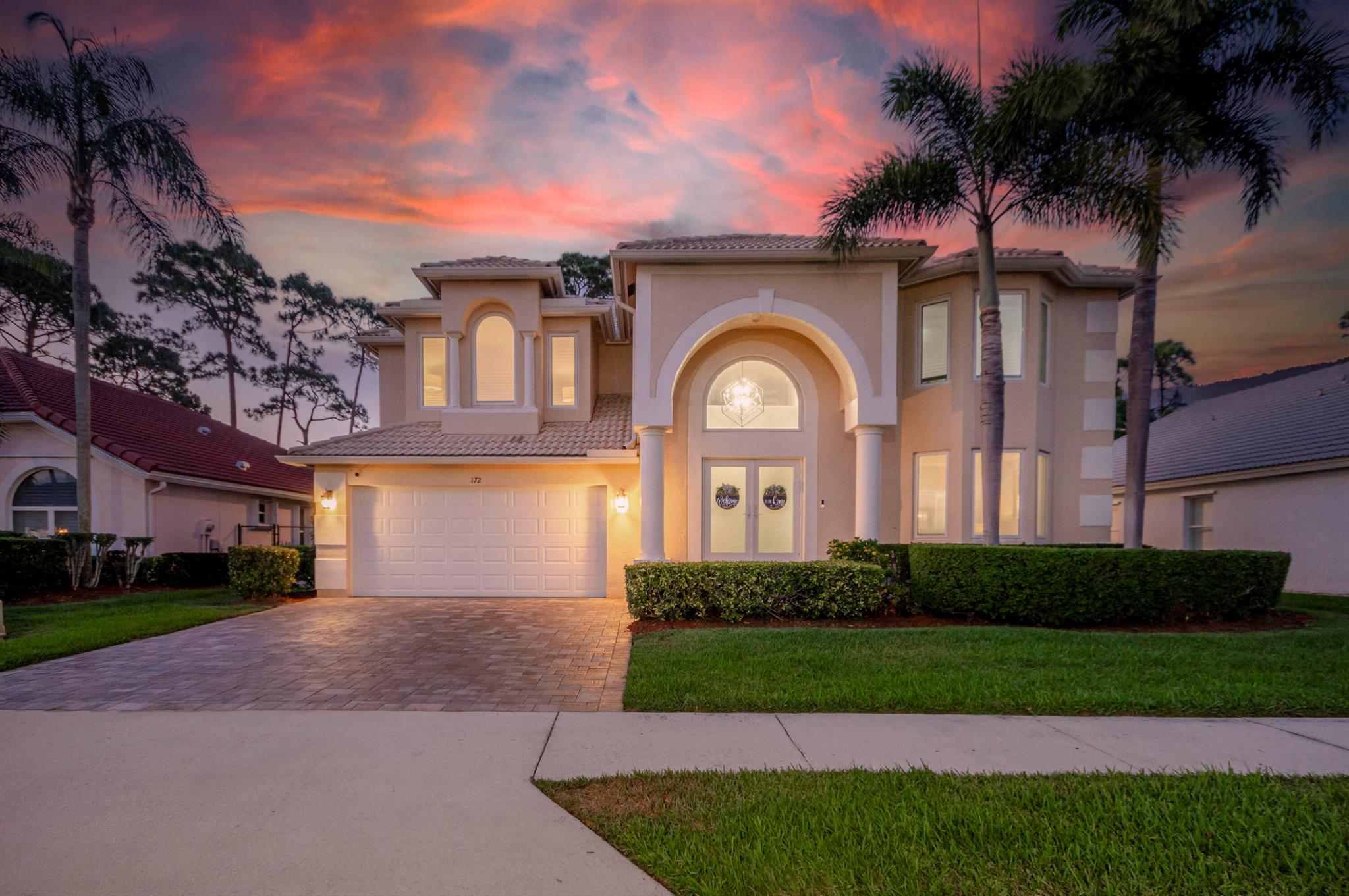 Ever wonder what over $400,000 in upgrades looks like? This beautifully updated 5 bedroom, 3 bath home that offers nearly 2,900 sq ft of living space has it all. Everything in this property has been updated, new custom pool, two newer AC's, whole house water filtration system, full impact glass windows and doors, top of the line kitchen appliances, not to mention exterior updates including the roof being replaced prior to closing, extended driveway, and custom exterior lighting. The expansive open floor plan features soaring ceilings, wood-look flooring, crown molding, and custom light fixtures throughout. The heart of the home is the gourmet kitchen, complete with natural gas, a large center island, sleek quartz countertops, white shaker cabinetry, and high-end Italian appliances, entertaining. The dining area is spacious and seamlessly opens to the living room, featuring fantastic natural light and beautiful tray ceilings that add both warmth and architectural charm. Step outside to your own private retreat. The large patio with elegant pavers surrounds a resort-style pool with sunshelf and spillover spa, all overlooking a peaceful preserve for ultimate privacy and serenity. Additional highlights include a whole-home generator, offering both peace of mind and long-term value. This move-in ready home in one of Palm Beach Gardens' most desirable gated communities is a rare find, centrally located with easy access to top-rated schools, shopping, dining, and everything the Palm Beaches have to offer.