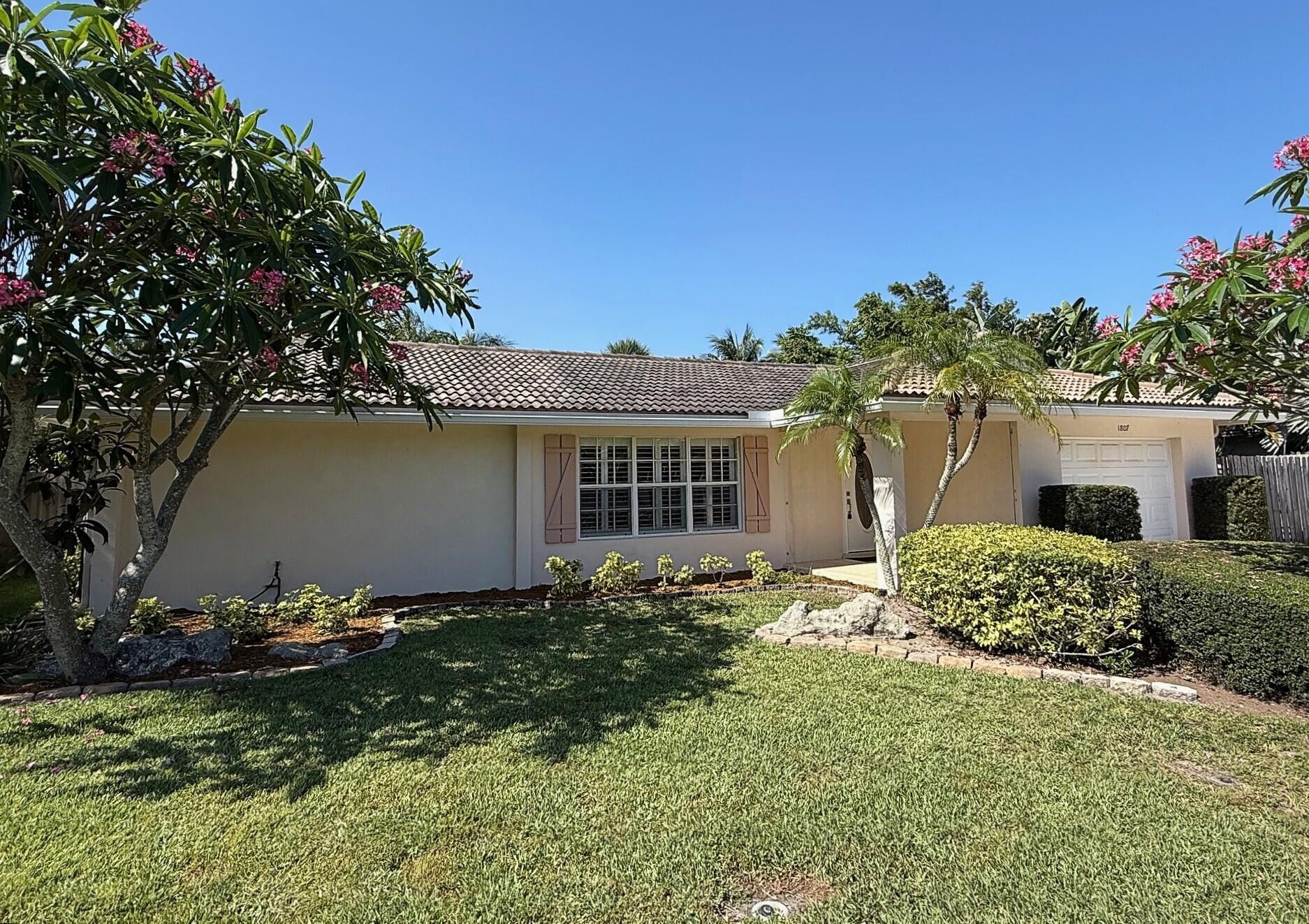 Beautifully renovated home in the coveted coastal neighborhood of Juno Isles. Less than a mile from the ocean, this 3-bedroom home features a split floorplan w/ lots of open space.  The updated kitchen opens to large pantry cabinets, an adjacent Florida/dining room, and the main living area. Perfect for entertaining.  In back you'll find a screened back patio that opens to a huge back yard.  Fruit trees, open space, and a 30x15 swimming pool are nestled w/in a fenced/private back yard.  There's even room for a boat or camper! Pet friendly neighborhood, quiet street, great schools, and very low HOA dues, and there are 2 boat ramps within a mile of your driveway. Simply put, they'll never make this neighborhood again!