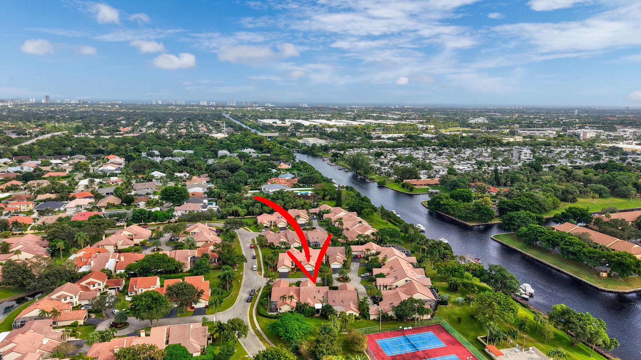 PRICE IMPROVEMENT Enhance your lifestyle at Waterside at Boca Trail, a stunning gated waterfront community in the HEART OF BOCA RATON. This exclusive neighborhood of 149 homes offers the best of Florida living with access to scenic views of the Hillsboro Canal, perfect for kayakers, and paddleboarders. Residents enjoy top-notch amenities, including a sparkling pool and tennis courts, all within a highly sought-after A-rated school district. This competitively priced 3-bedroom, 3-bathroom home boasts a thoughtful two-story layout with a first-floor primary suite complete with an ensuite bath, a second large bedroom near a full bath, upstairs, the third bedroom and full bathroom next to an airy loft area. Additional features include a two-car garage, making this home as practical as it is charming.
Close to beautiful beaches, Mizner Park, Boca Town Center, and the area's finest dining, Waterside at Boca Trail is a rare find for those seeking comfort, convenience, and coastal charm, and access to the main highways.