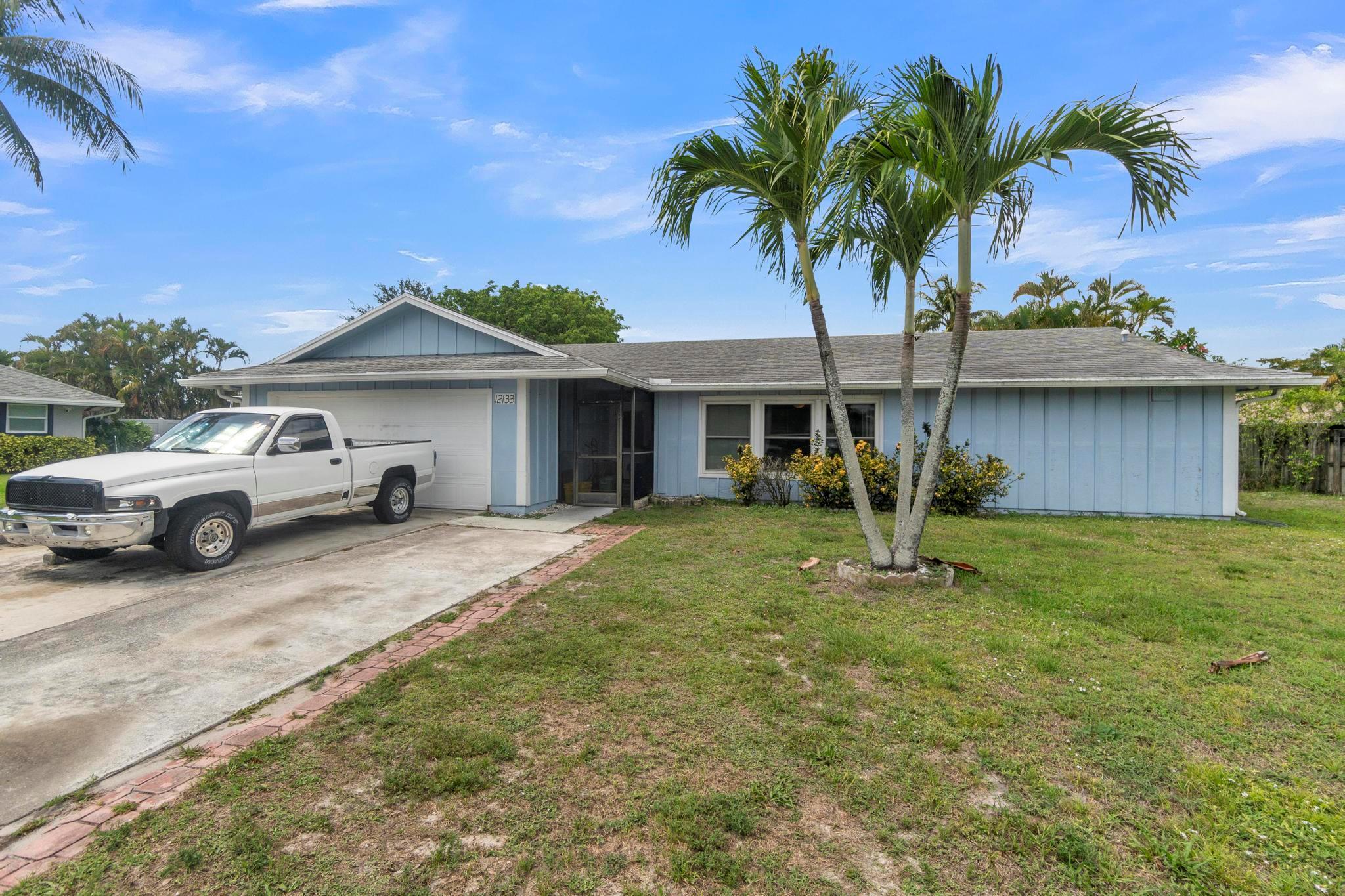**MOTIVATED SELLER!!!**This 4 bedroom, 2 bathroom single family home with a pool sits in the heart of Wellington on a quiet cul-de-sac with NO HOA! Features include pool, newer impact windows, newer AC, fenced yard, bonus room, enclosed patio, 2 car garage and large driveway.