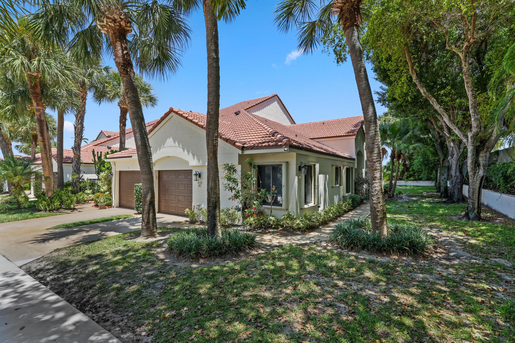 Enjoy the beach lifestyle with privacy in this END UNIT VILLA  located in the sought-after community of Sea Oats.  Updates include: Impact windows throughout 2022; Polybutylene pipes replaced; AC Condenser 2023; Water heater 2014; New washer/dryer.  Walking distance to Juno Beach (
